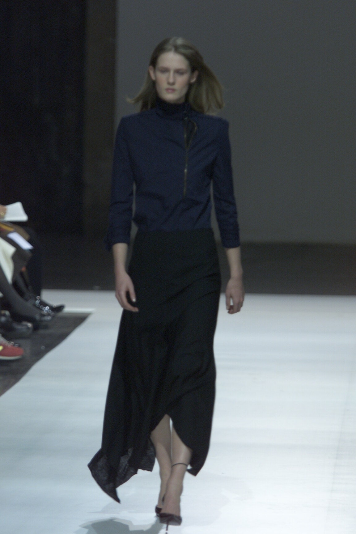 black fitted top and asymmetric skirt