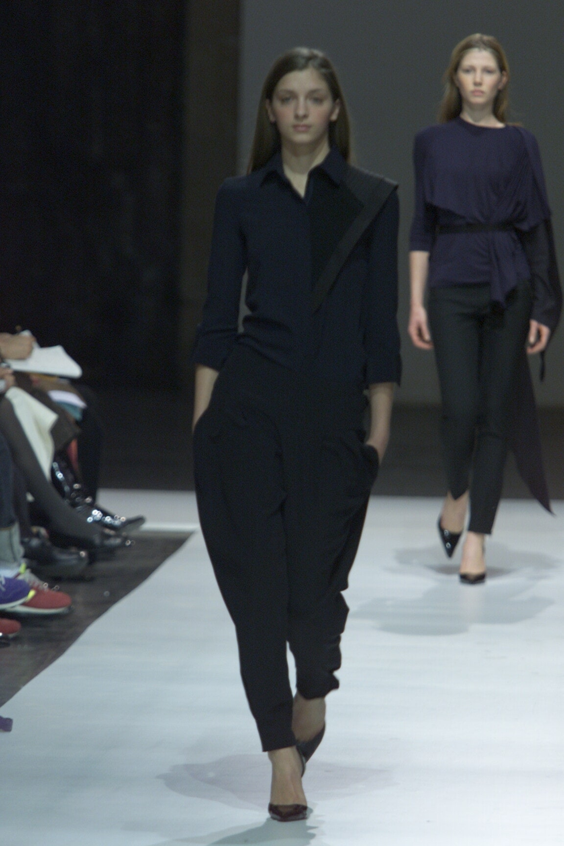 black fitted jumpsuit and relaxed top