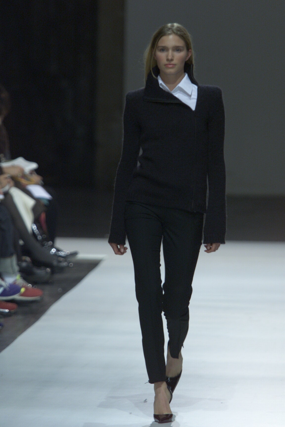 black fitted top and slim pants