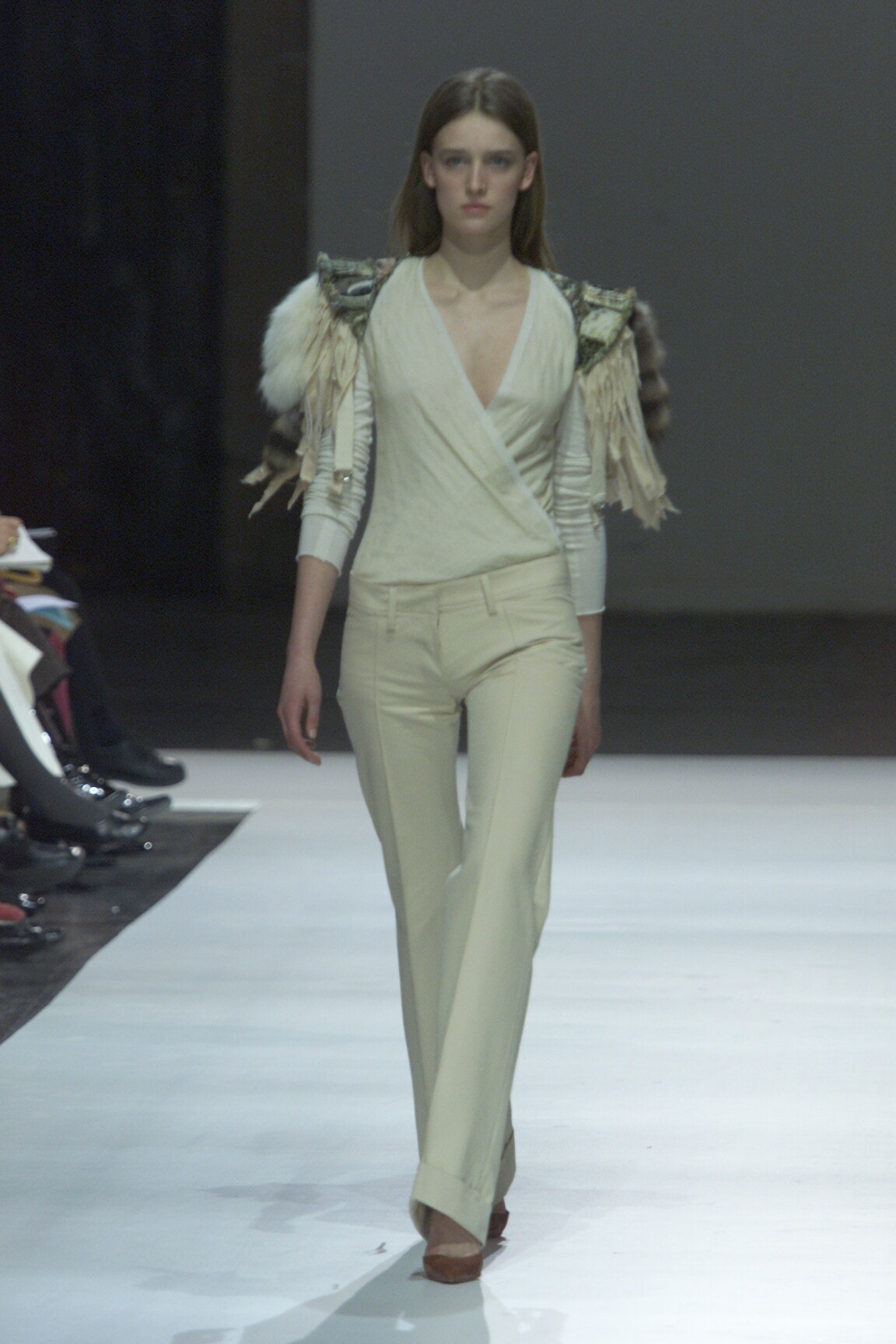 white fitted top with flared pants