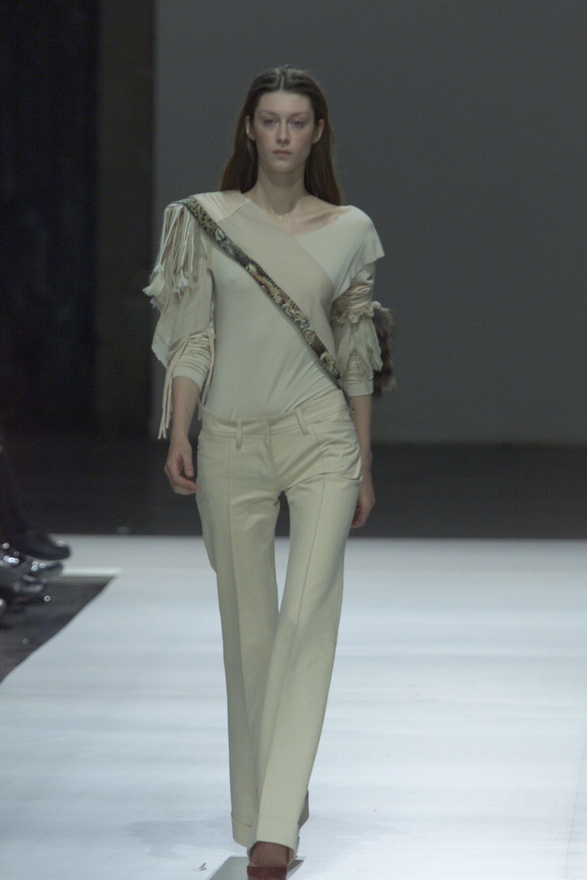 white fitted top and beige tailored pants
