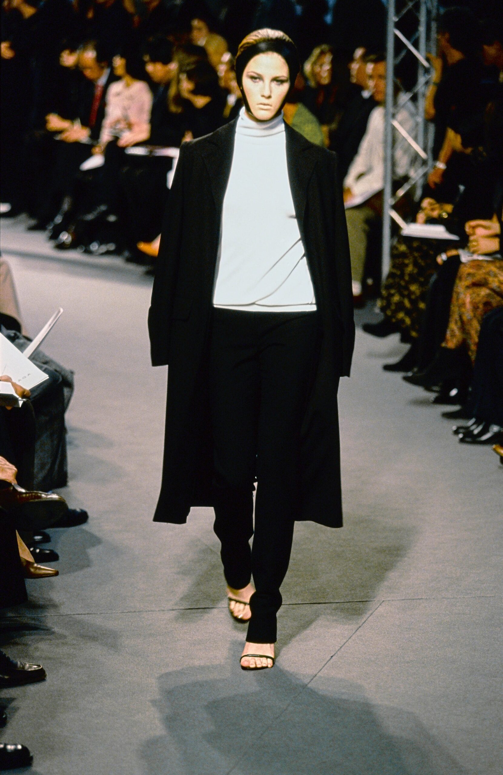 black wool long-sleeve collared relaxed buttoned coat