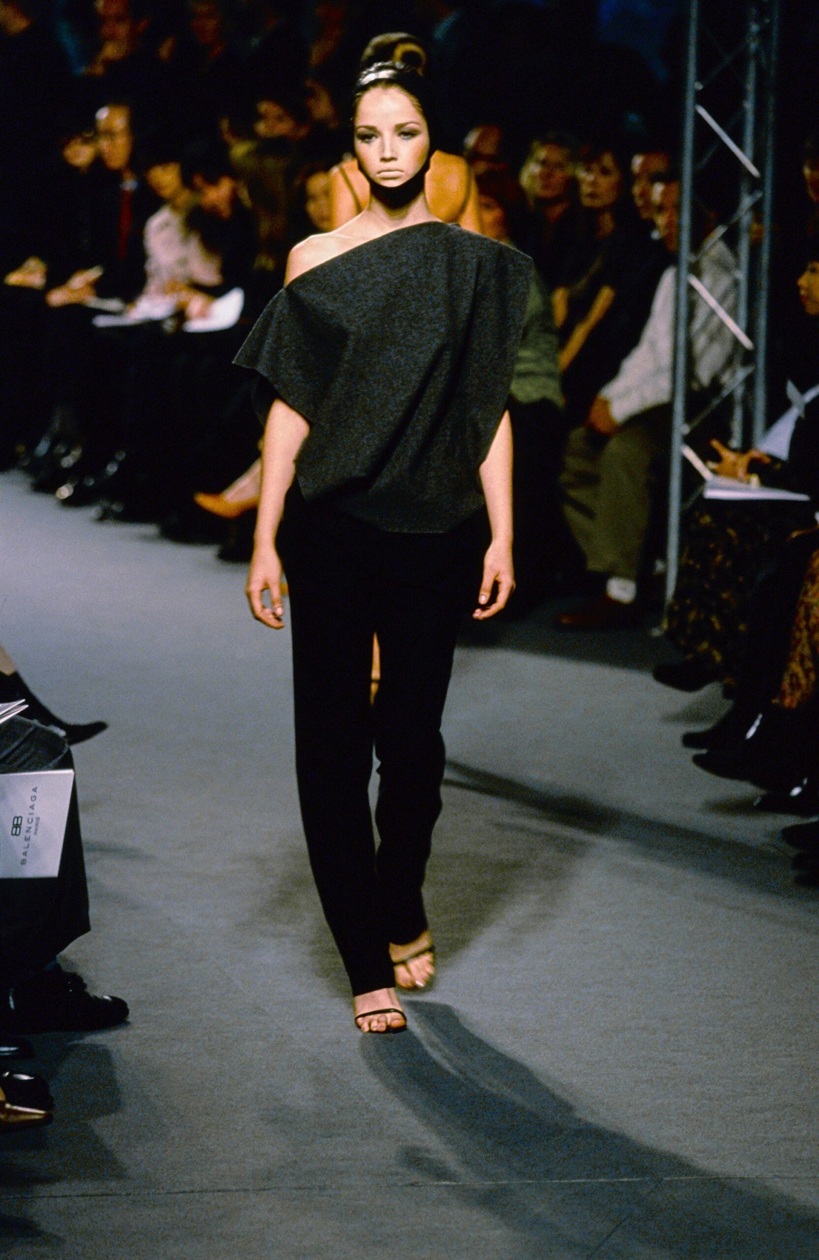 black relaxed top with fitted pants