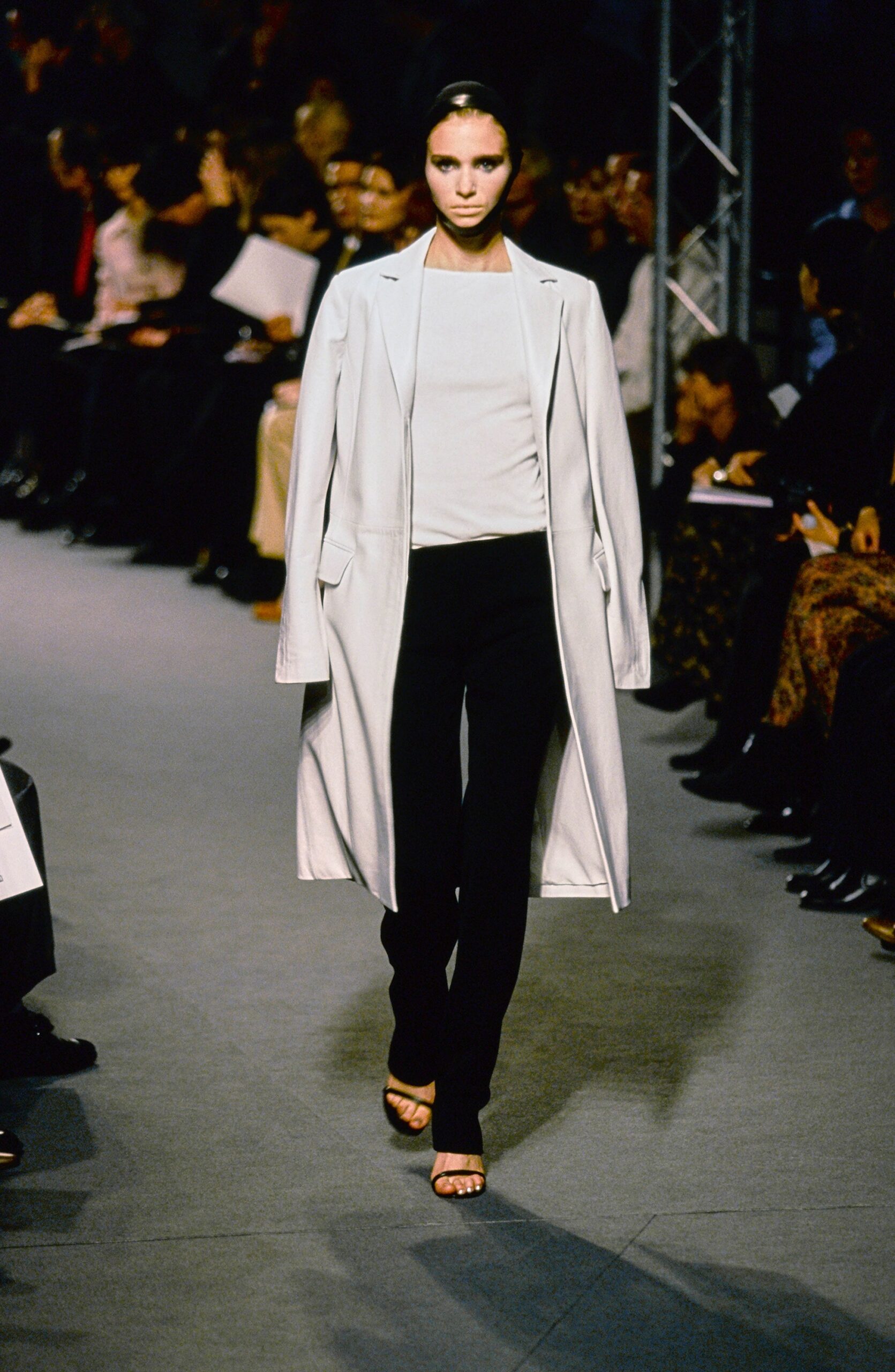white cotton long-sleeve collared relaxed buttoned coat