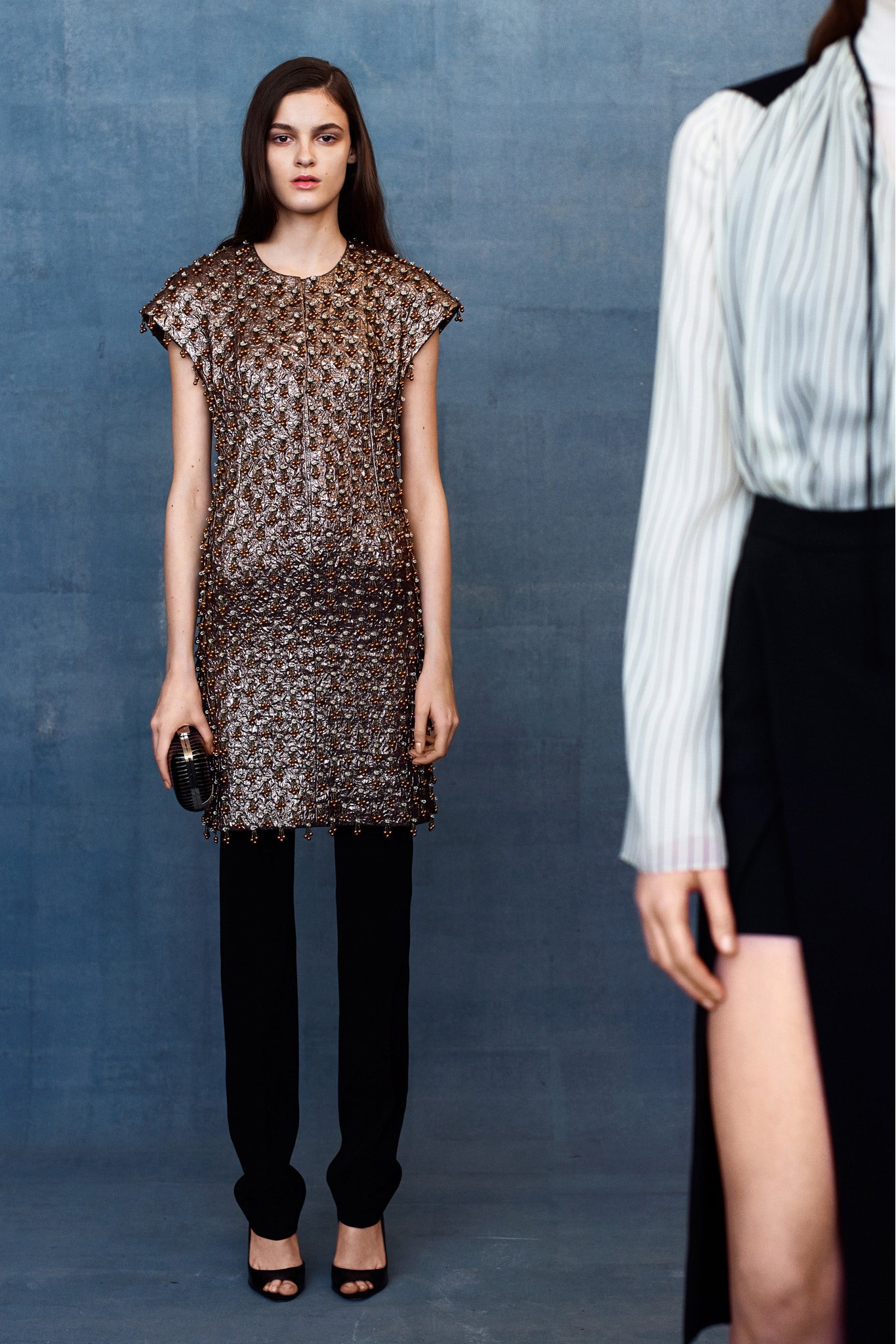 brown beaded mini dress with black pants