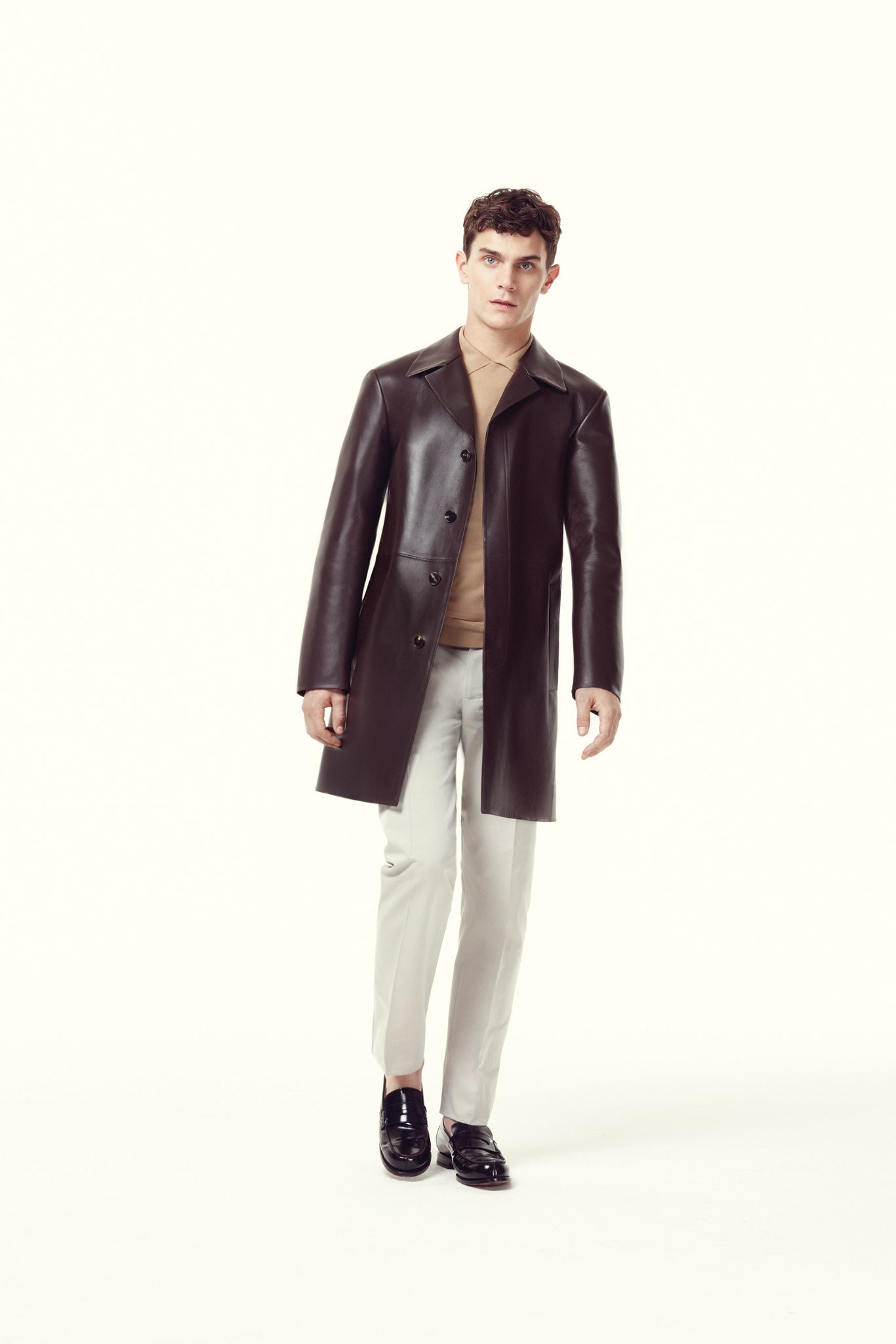 black leather coat with tailored pants