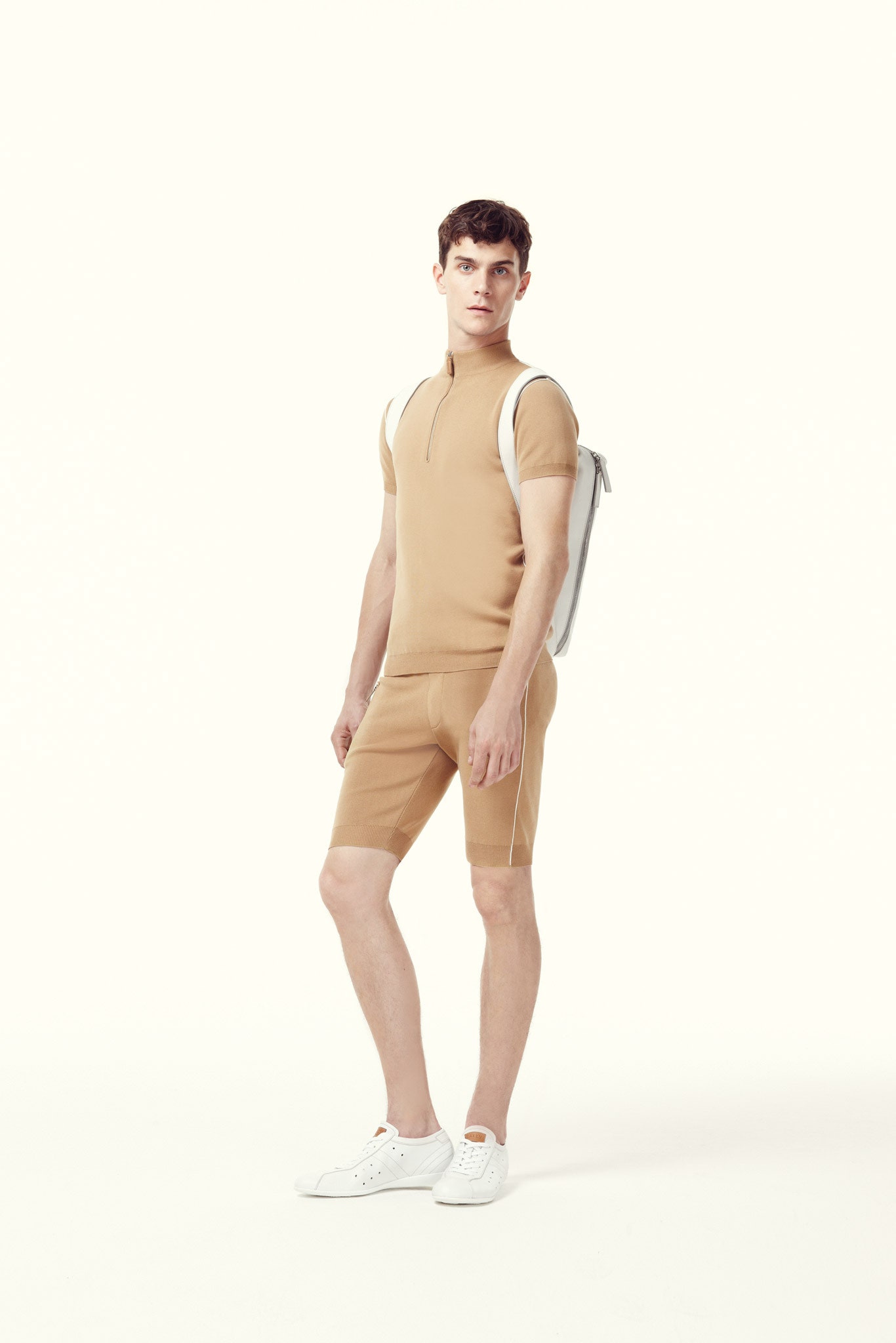 beige fitted top and shorts