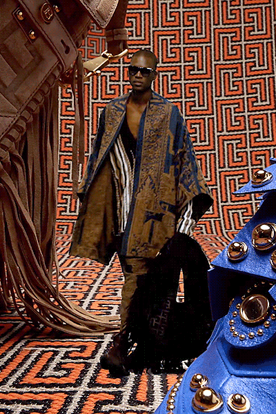 blue silk cape with black pants