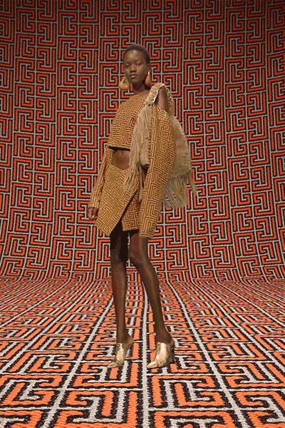 brown and orange printed top and mini skirt