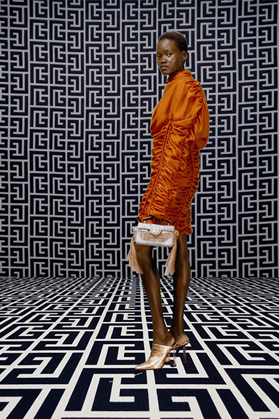 orange silk long-sleeve v-neck fitted ruched mini dress