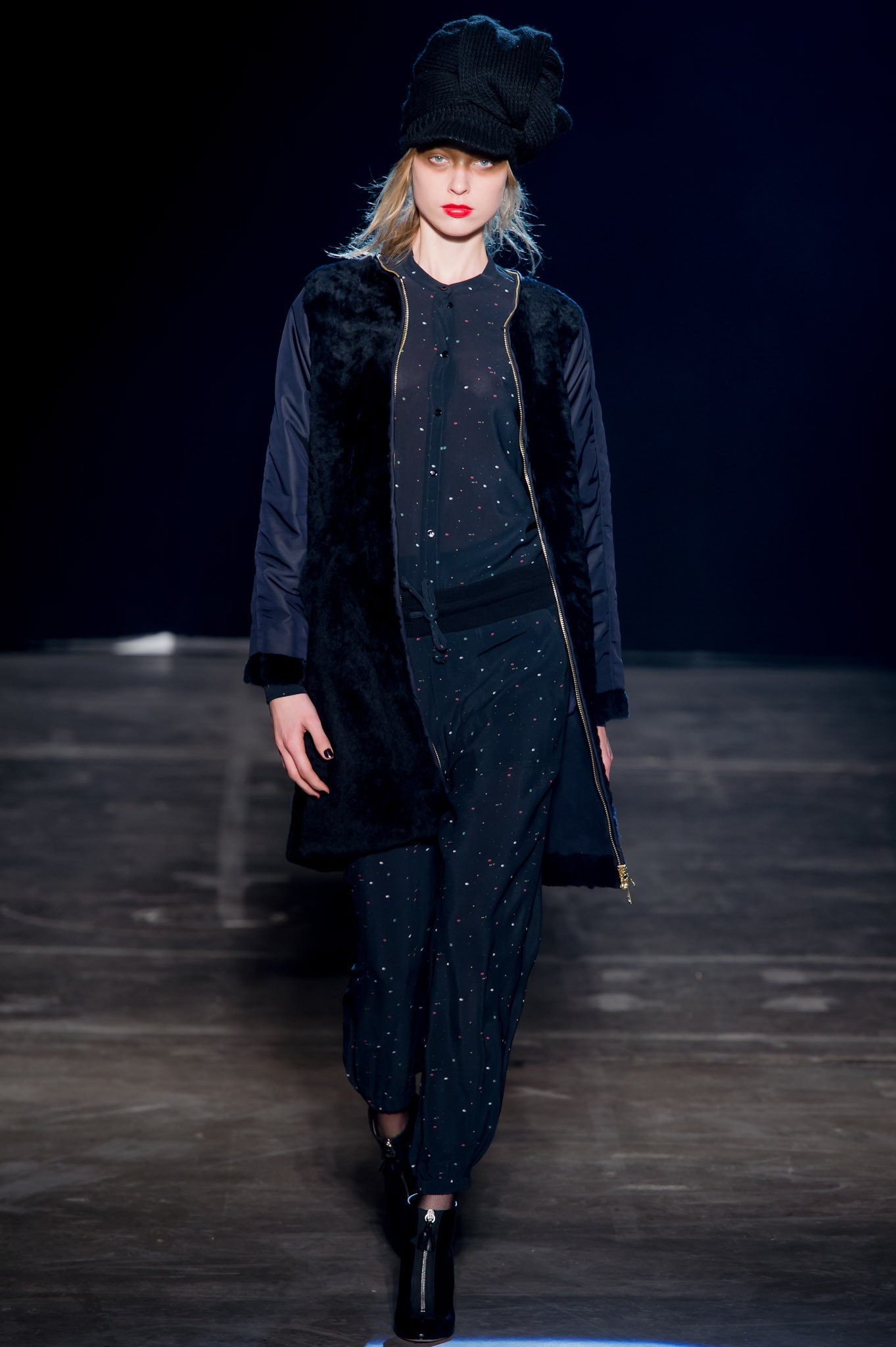 black faux-fur coat with jumpsuit