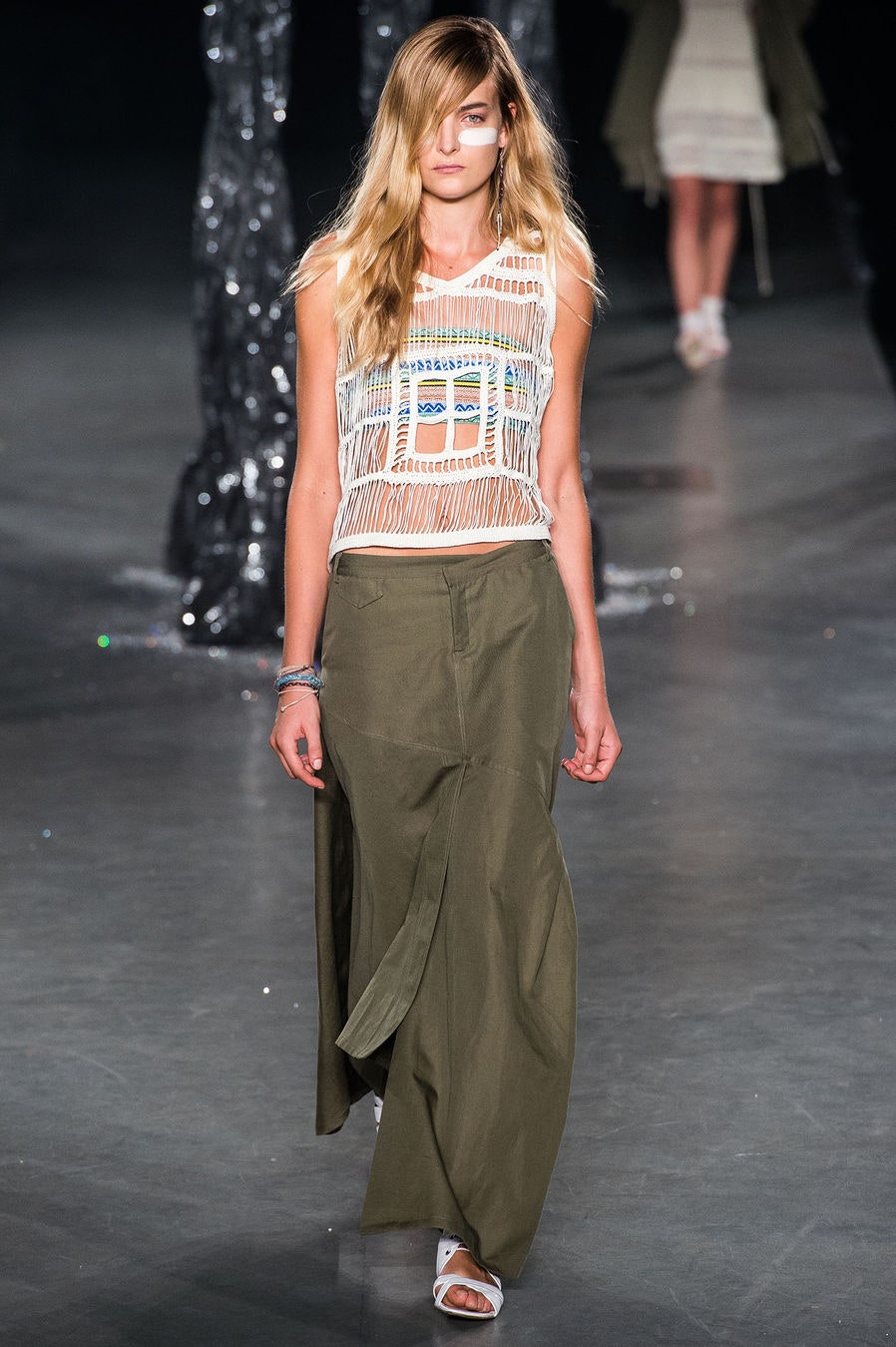 fringed white top with green maxi skirt