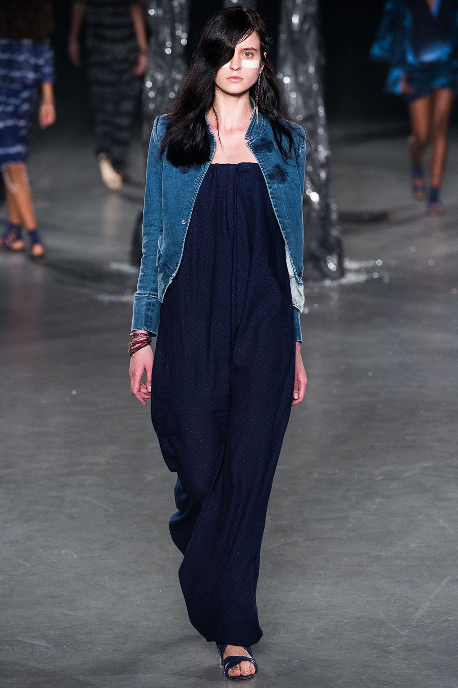 blue denim jacket and navy jumpsuit