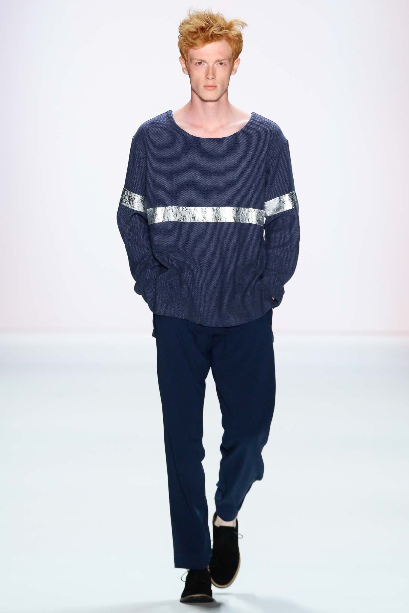 blue relaxed top with navy tailored pants