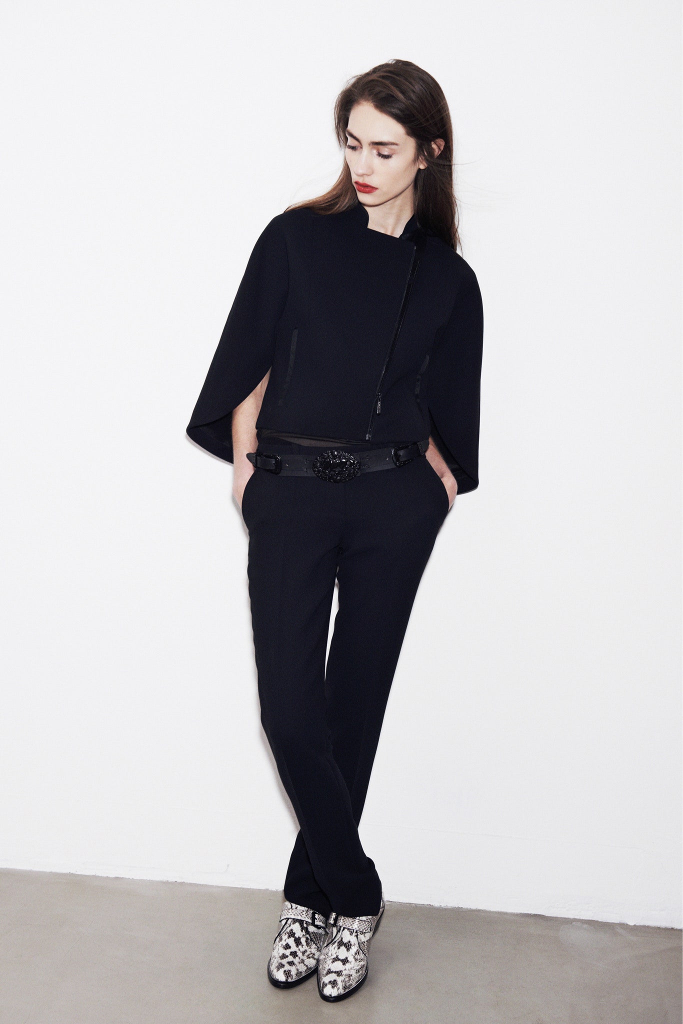 black fitted top and tailored pants