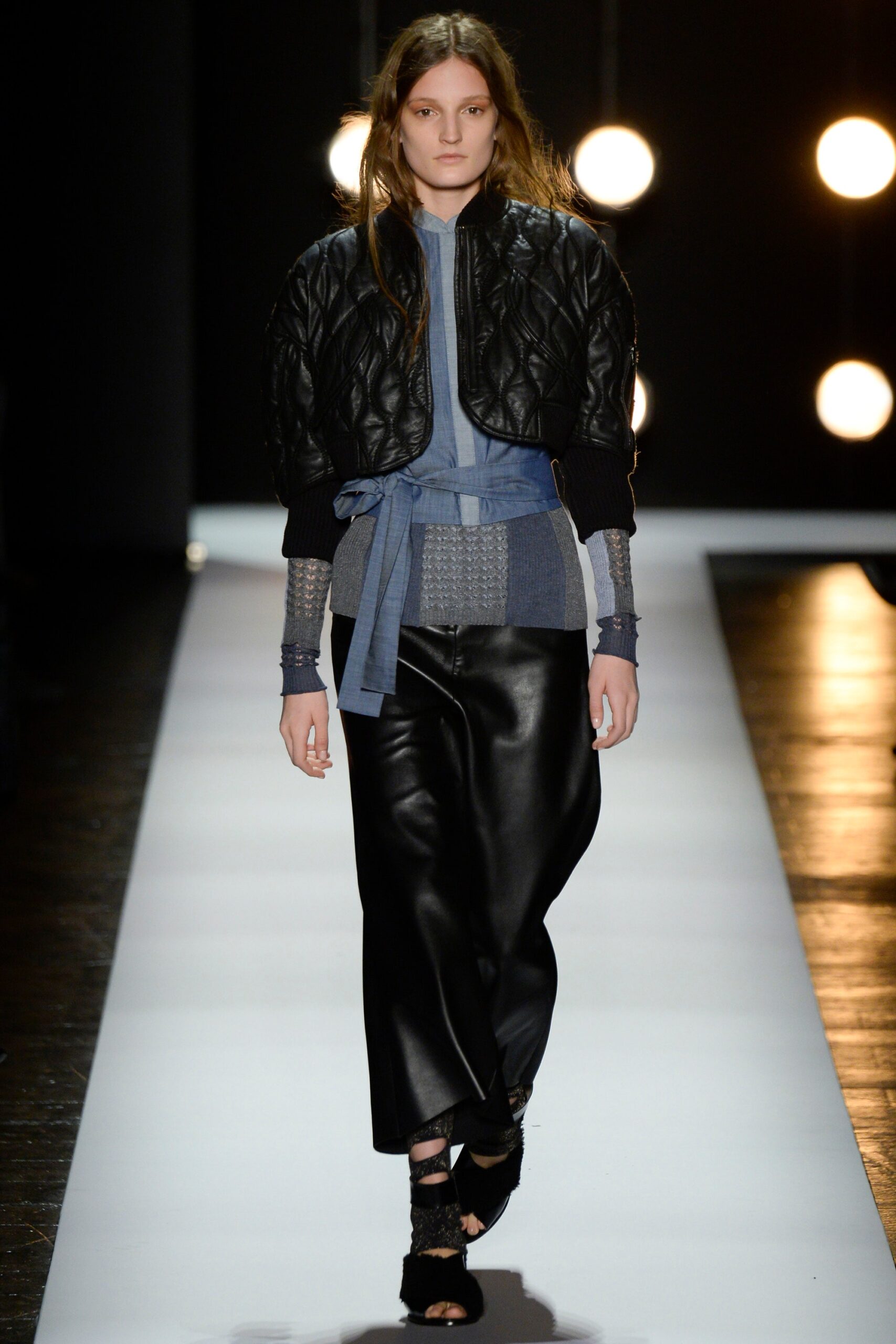 black leather jacket with blue top