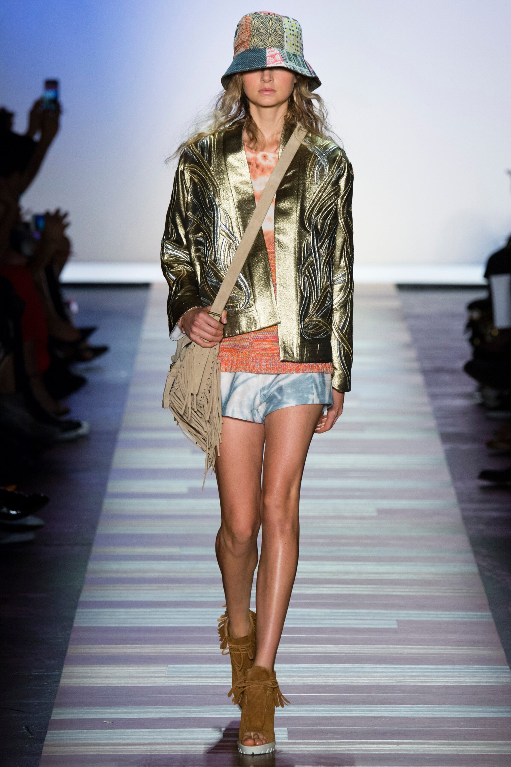 gold metallic jacket with denim shorts
