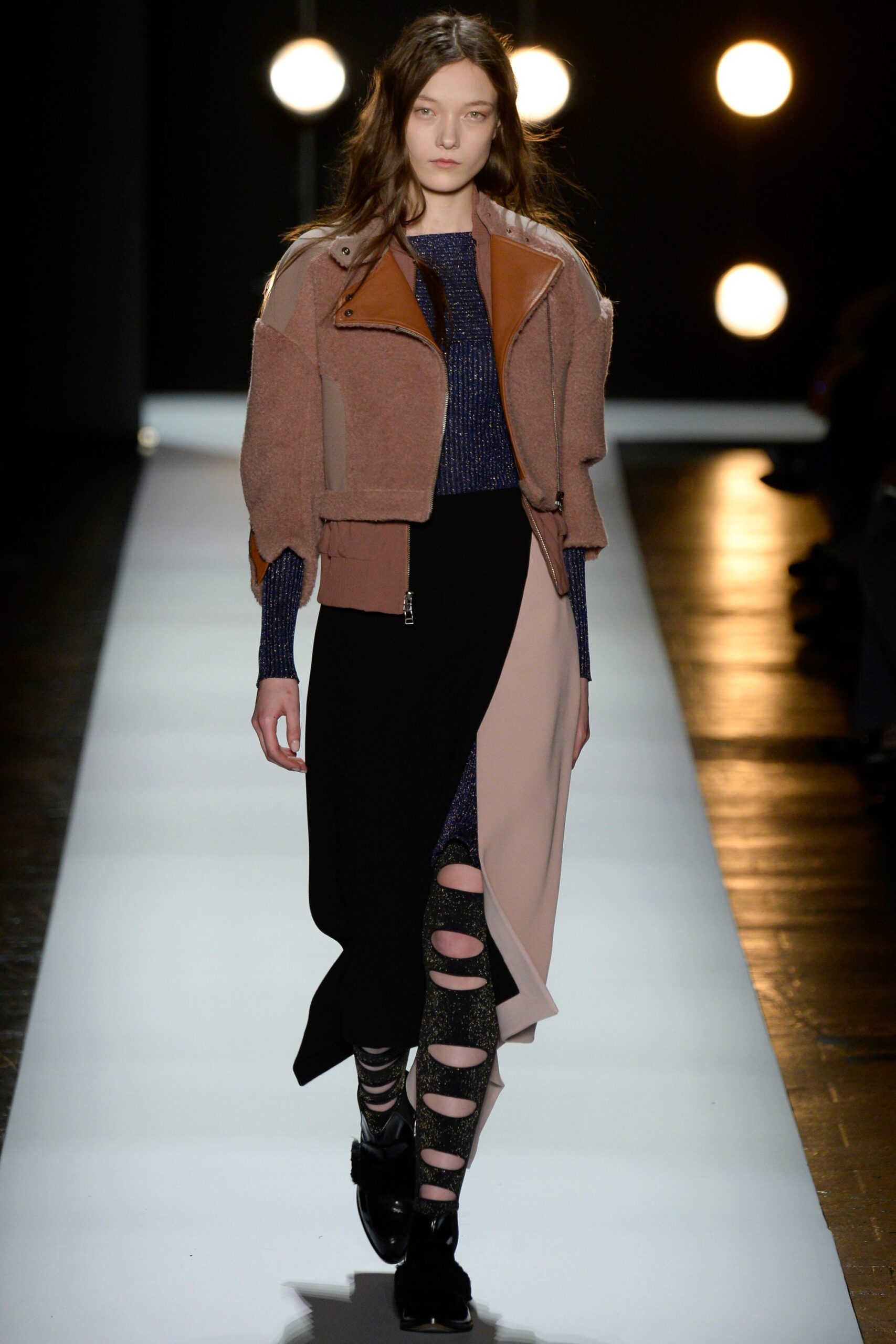 brown leather fitted jacket with asymmetric skirt