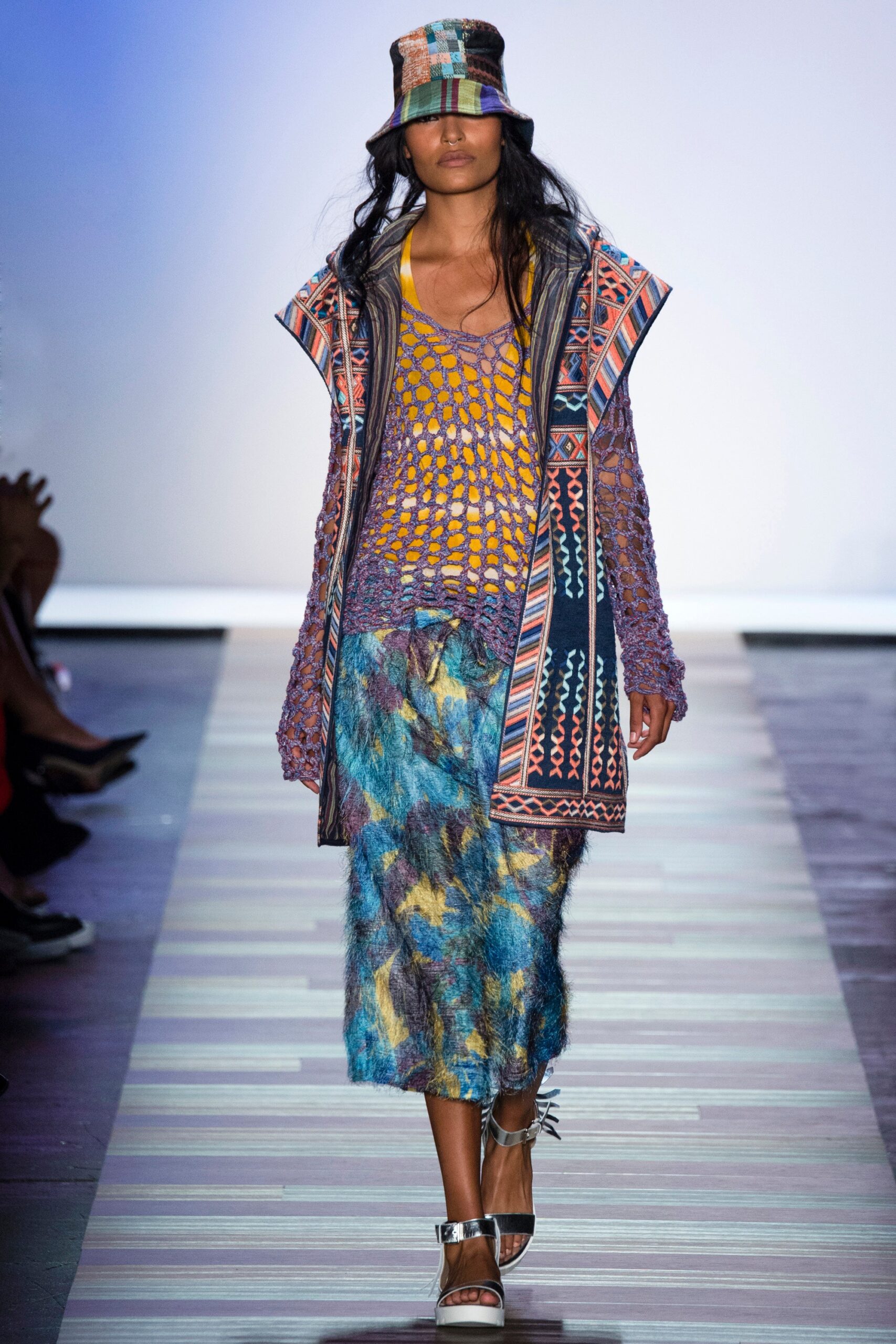 colorful layered outfit with hat