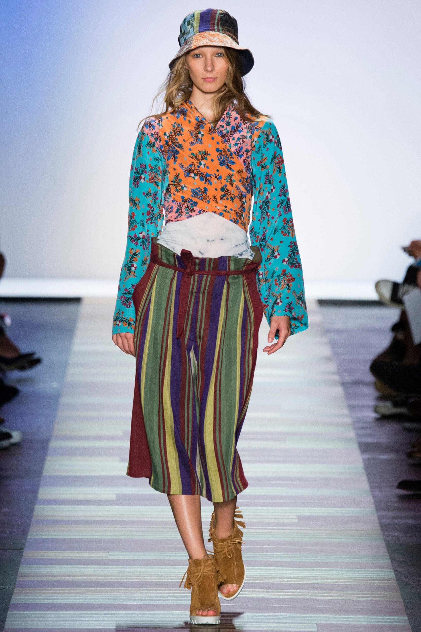 colorful floral top with striped pants