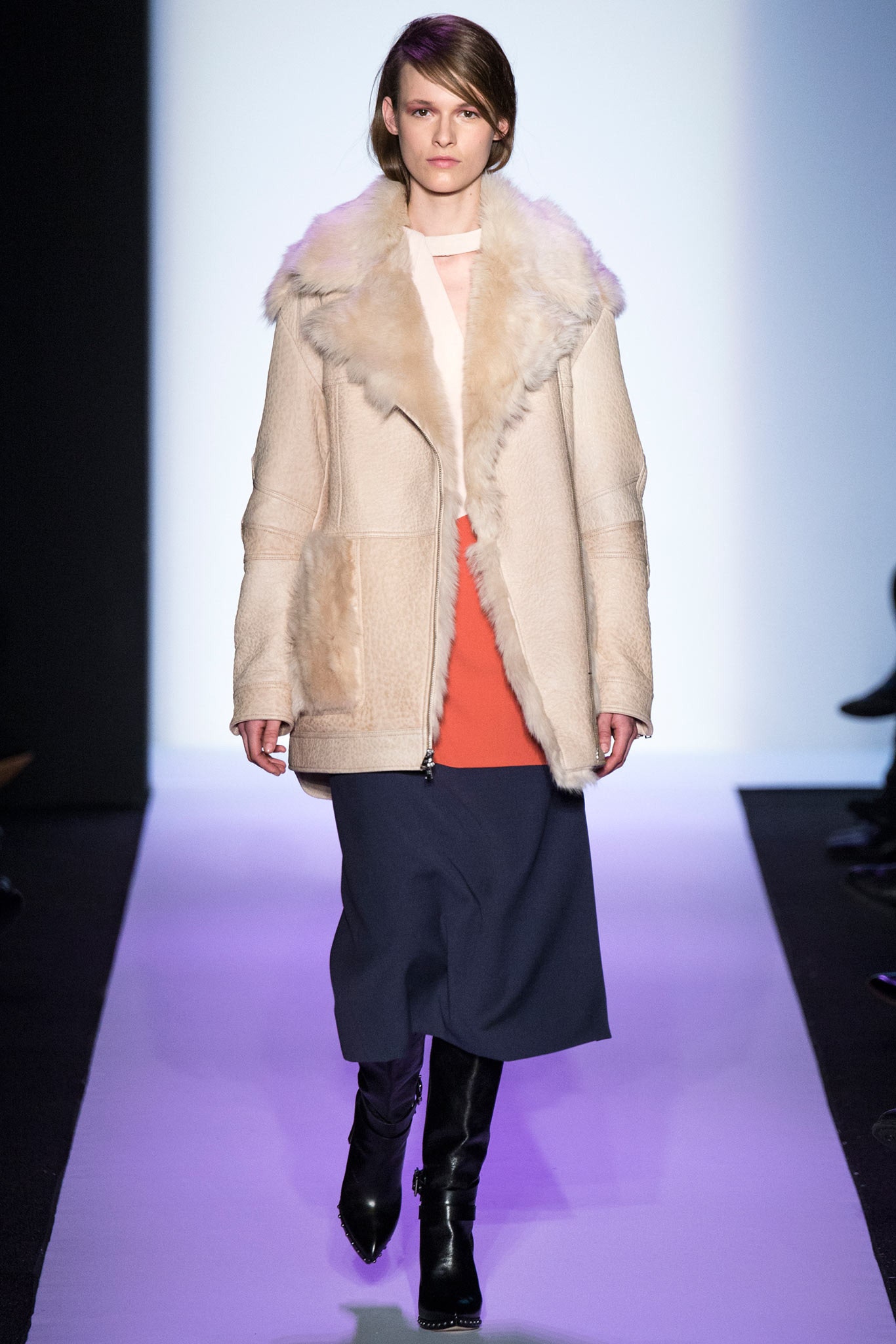 beige fur coat with orange dress