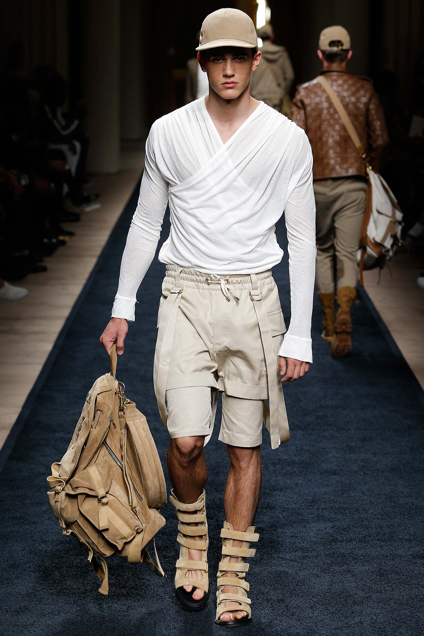 white fitted shirt with beige shorts