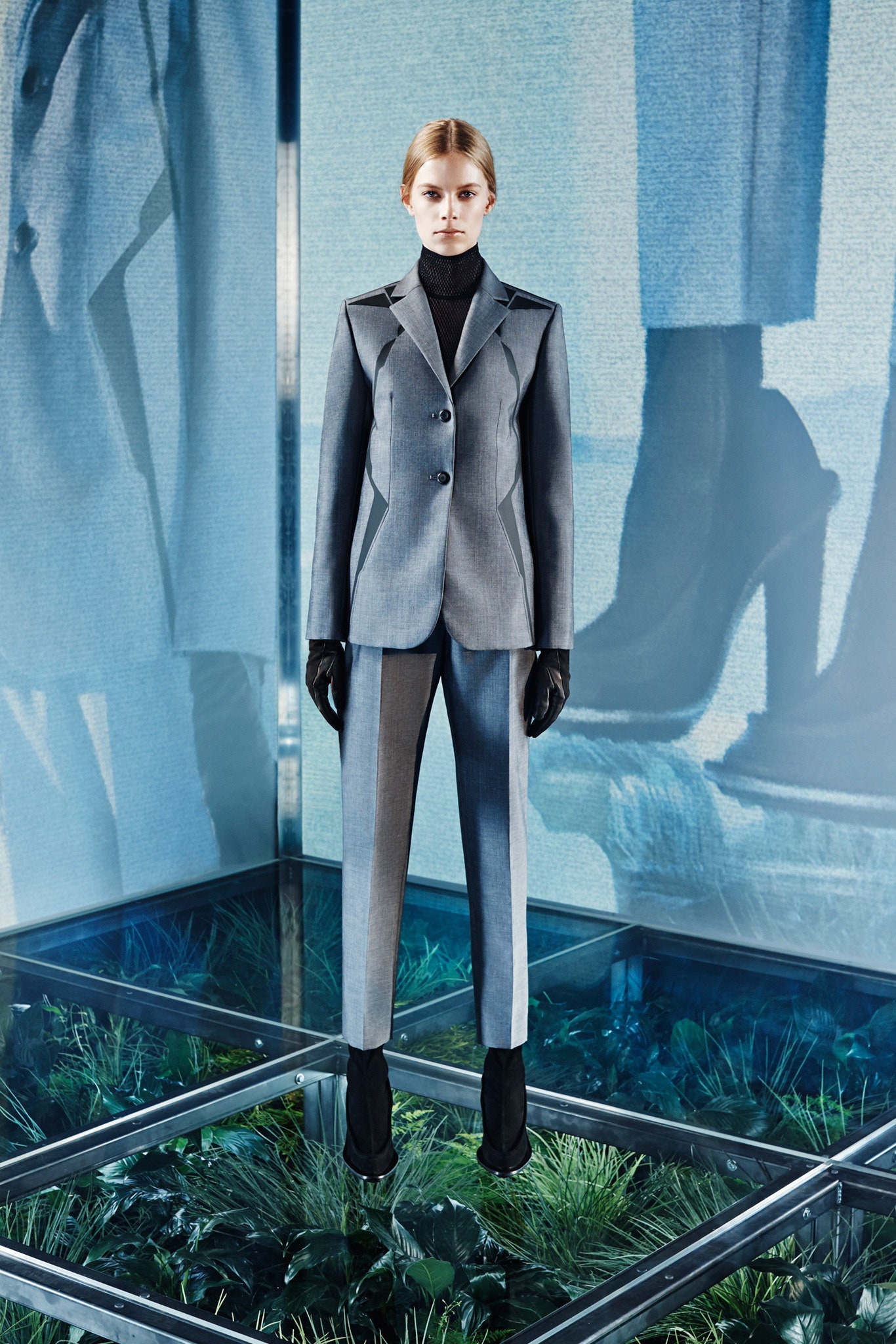 gray tailored suit with gloves
