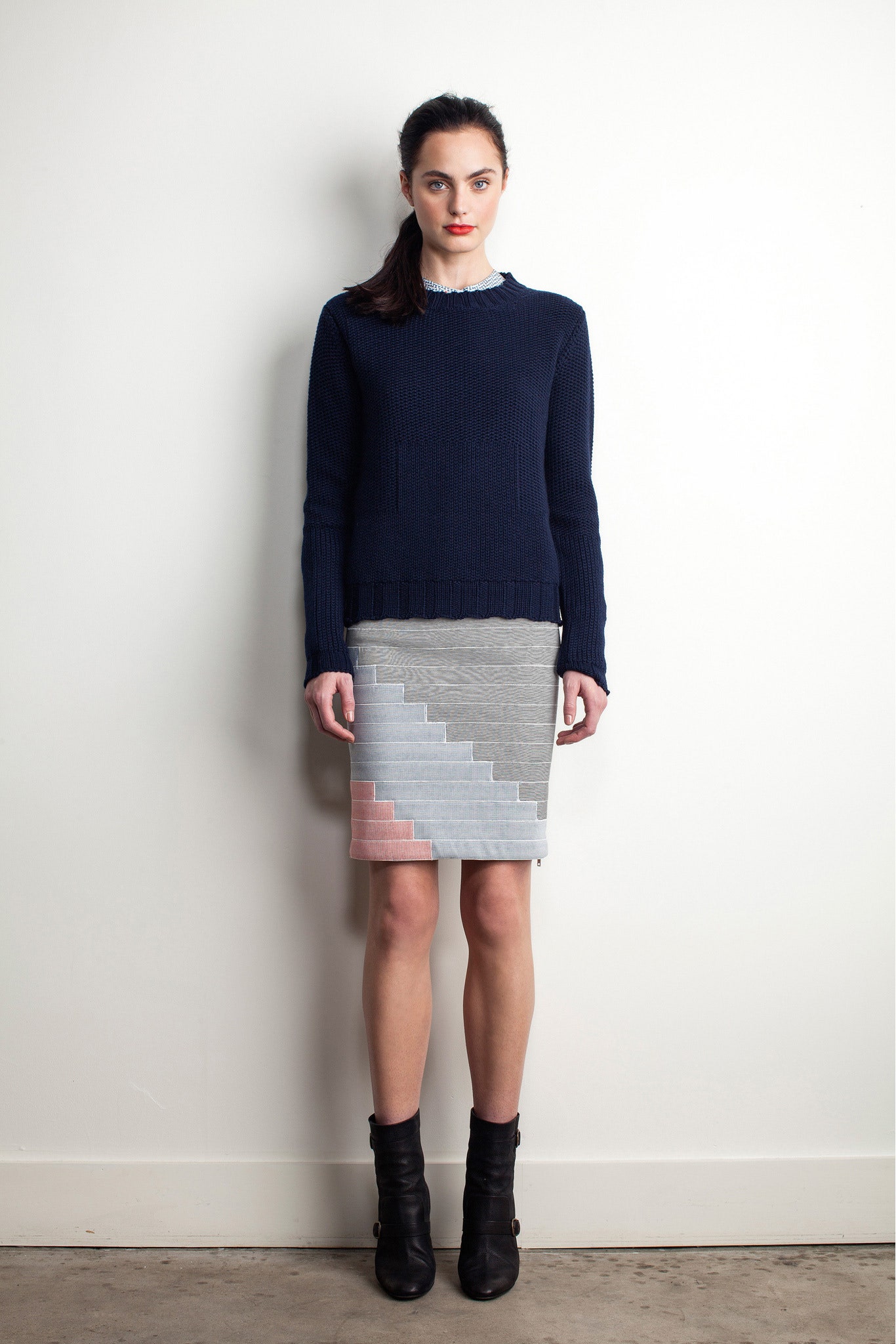 navy wool fitted sweater with gray pencil skirt