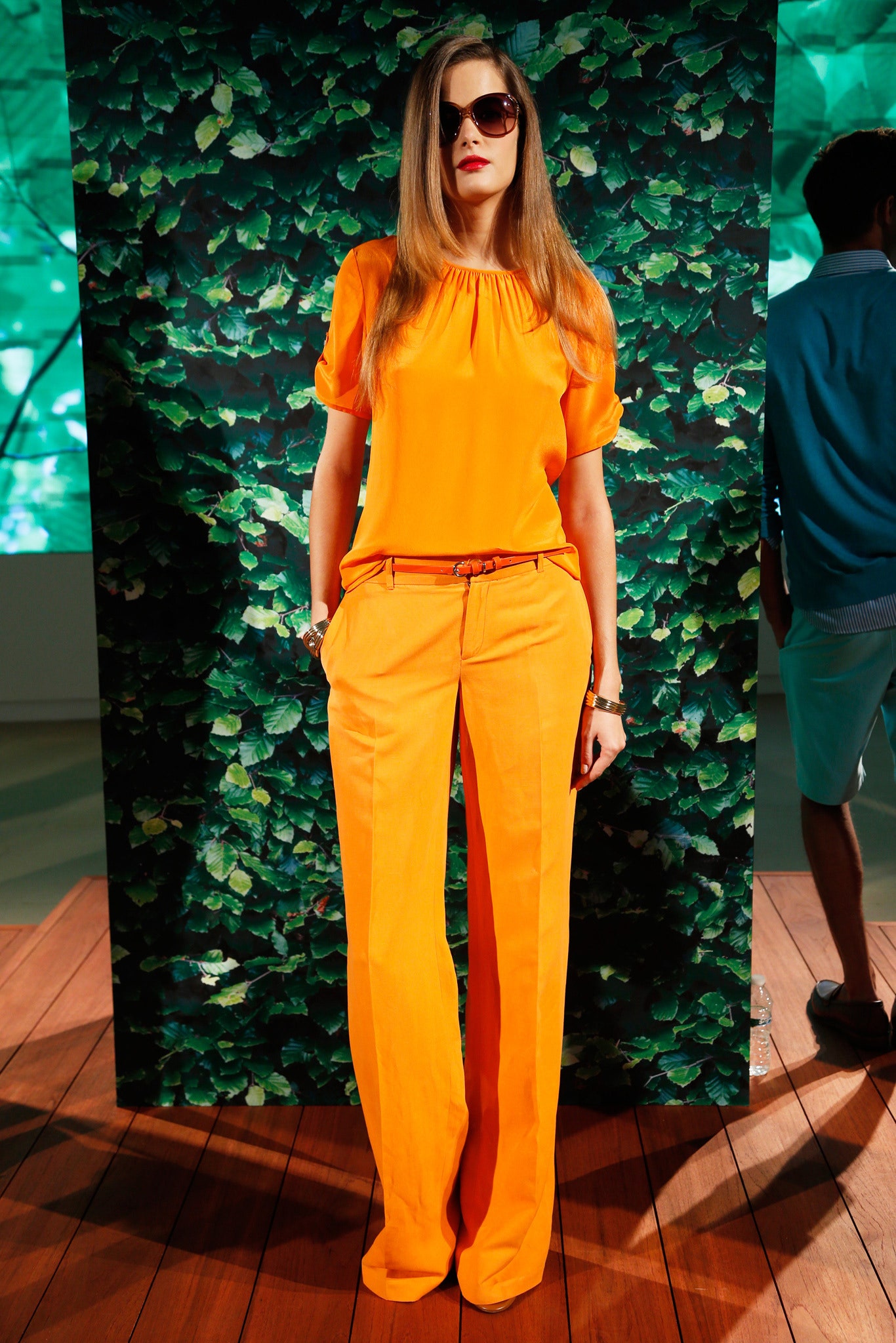 orange relaxed top with tailored pants