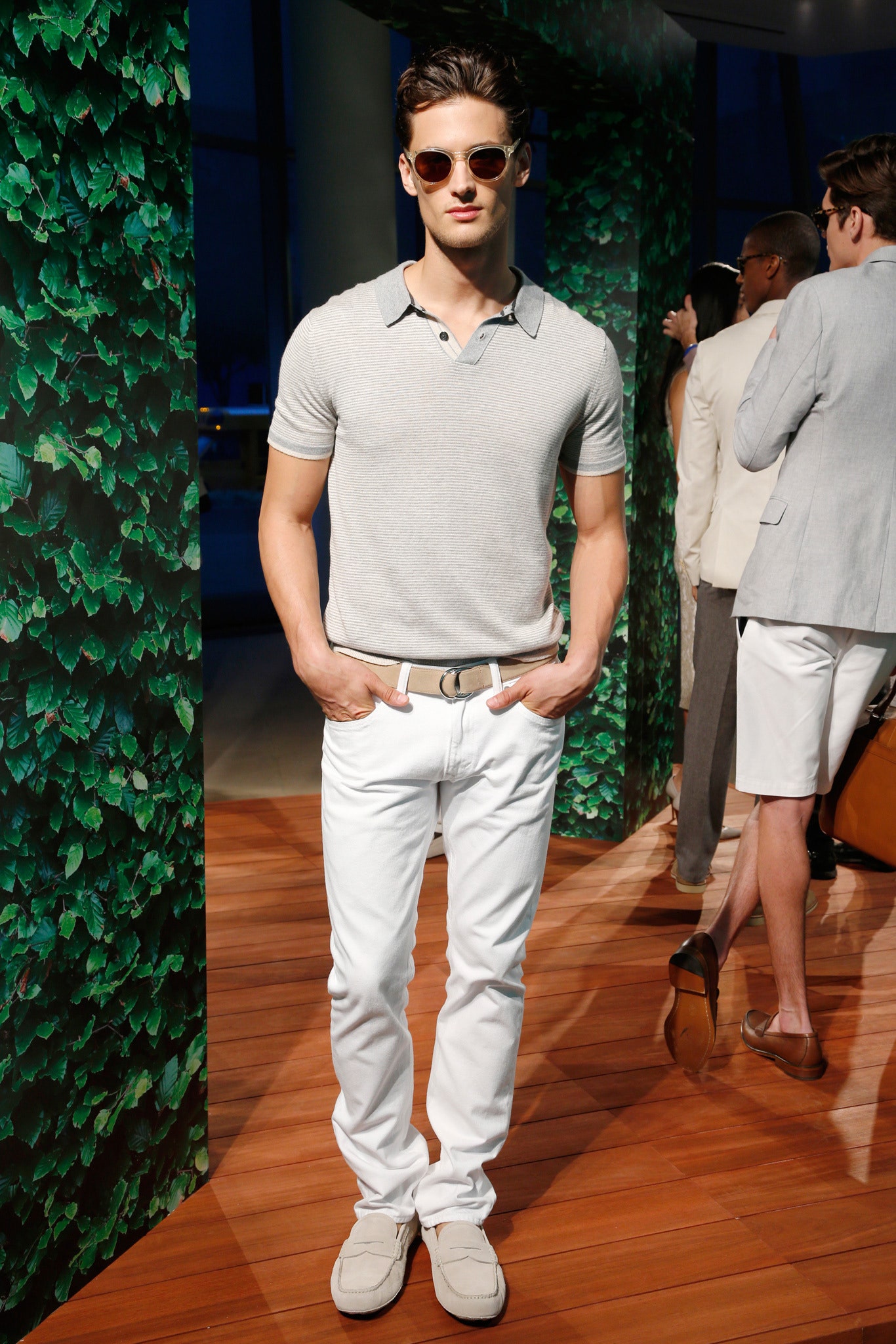 gray collared shirt with white pants