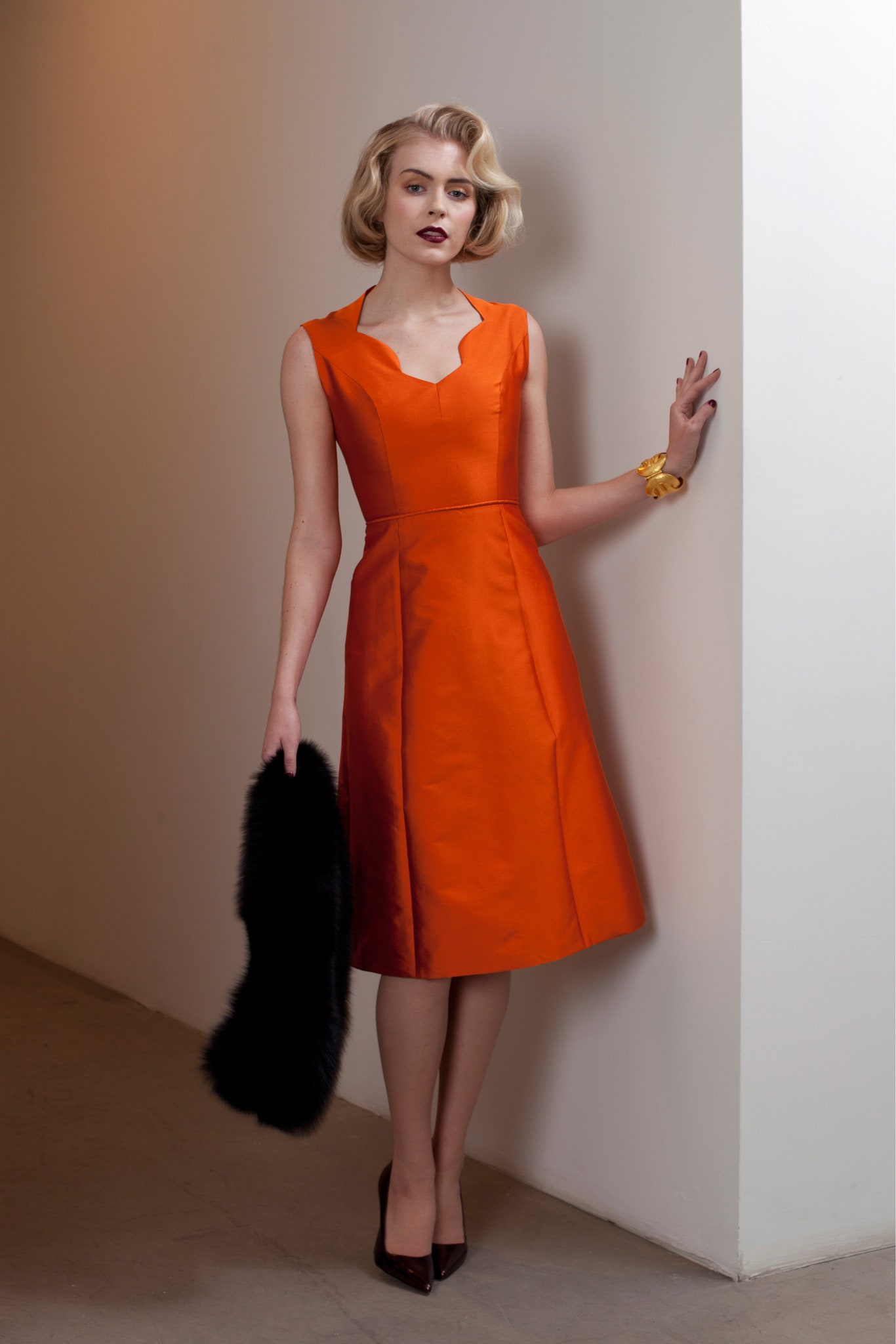 fitted orange silk midi dress
