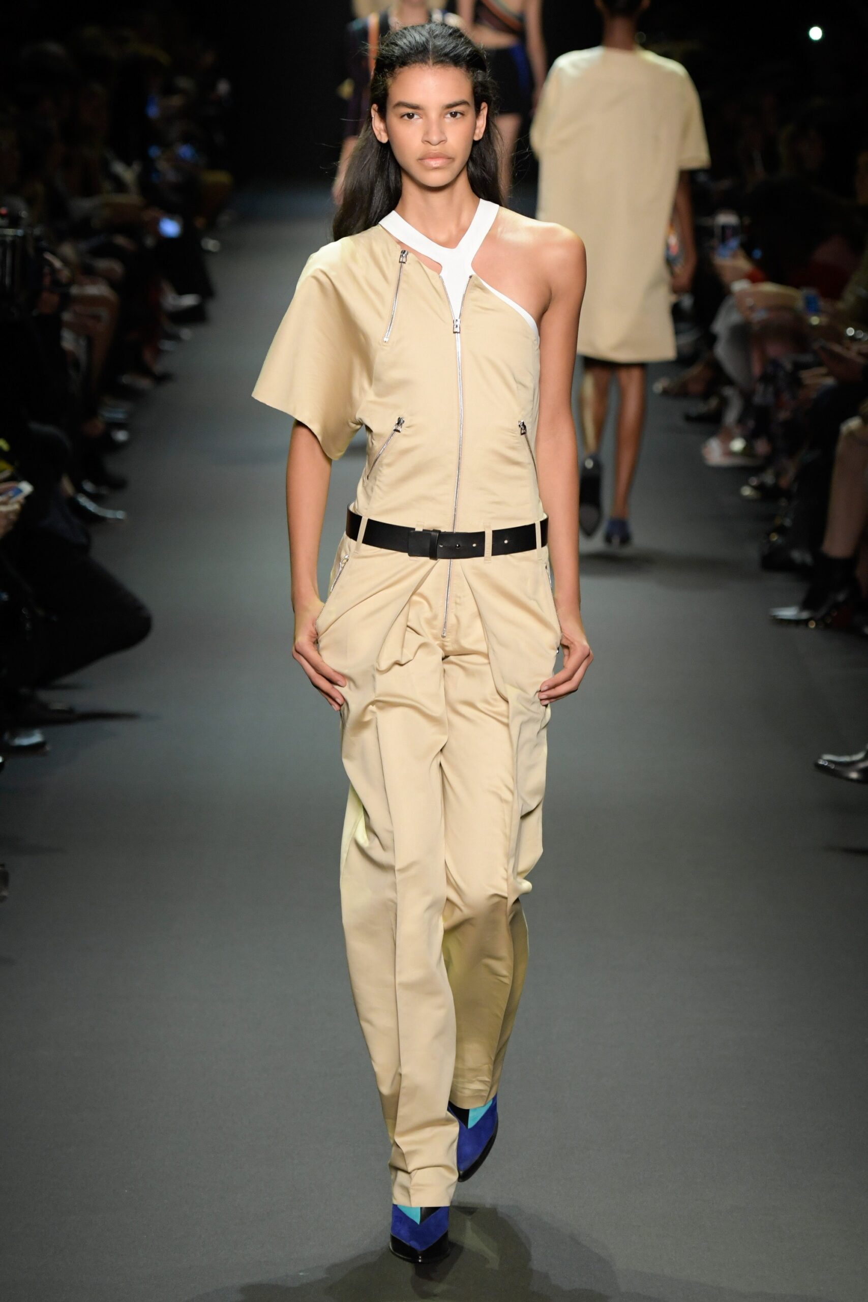 beige fitted jumpsuit with asymmetric detail