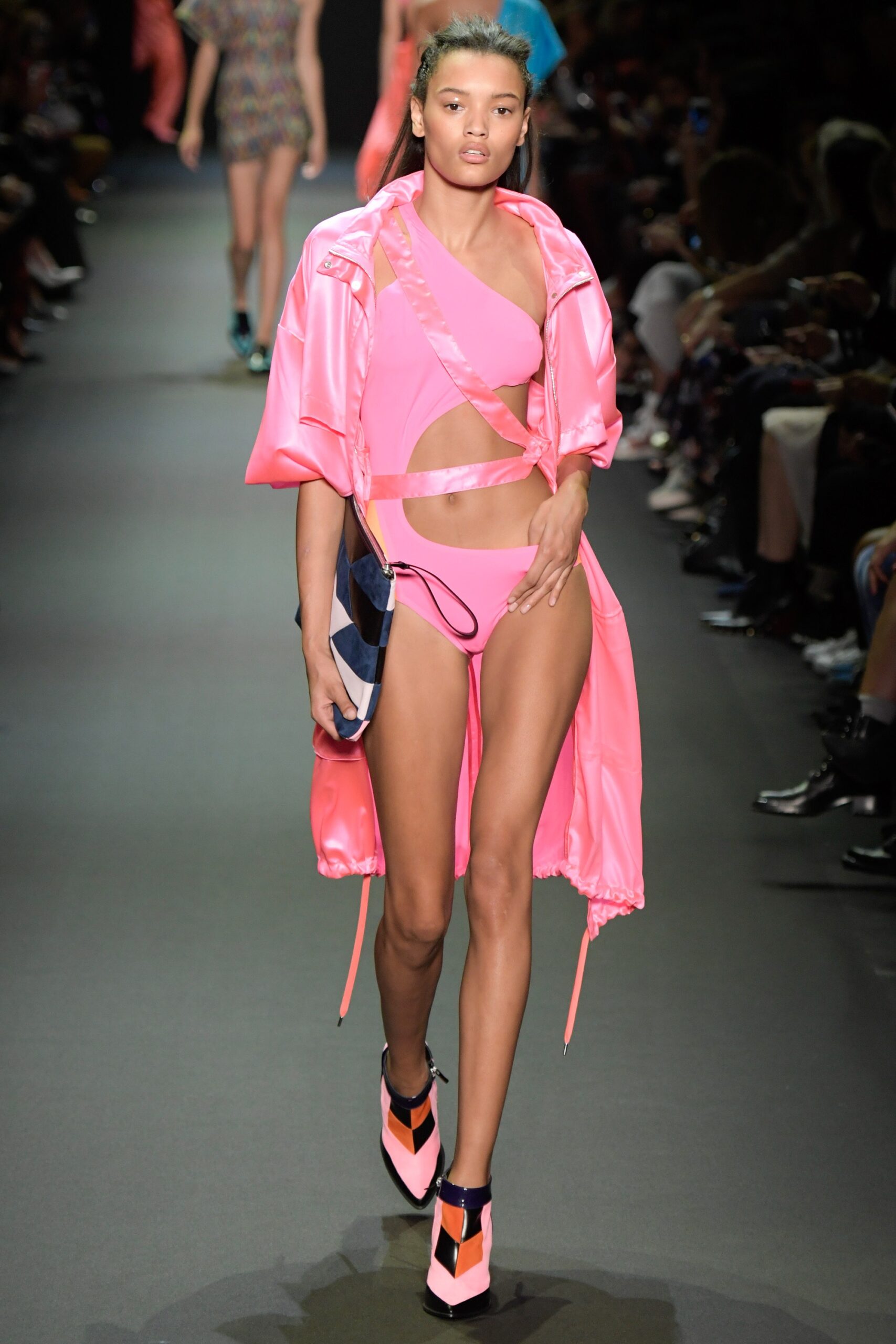 pink neoprene swimsuit with oversized coat