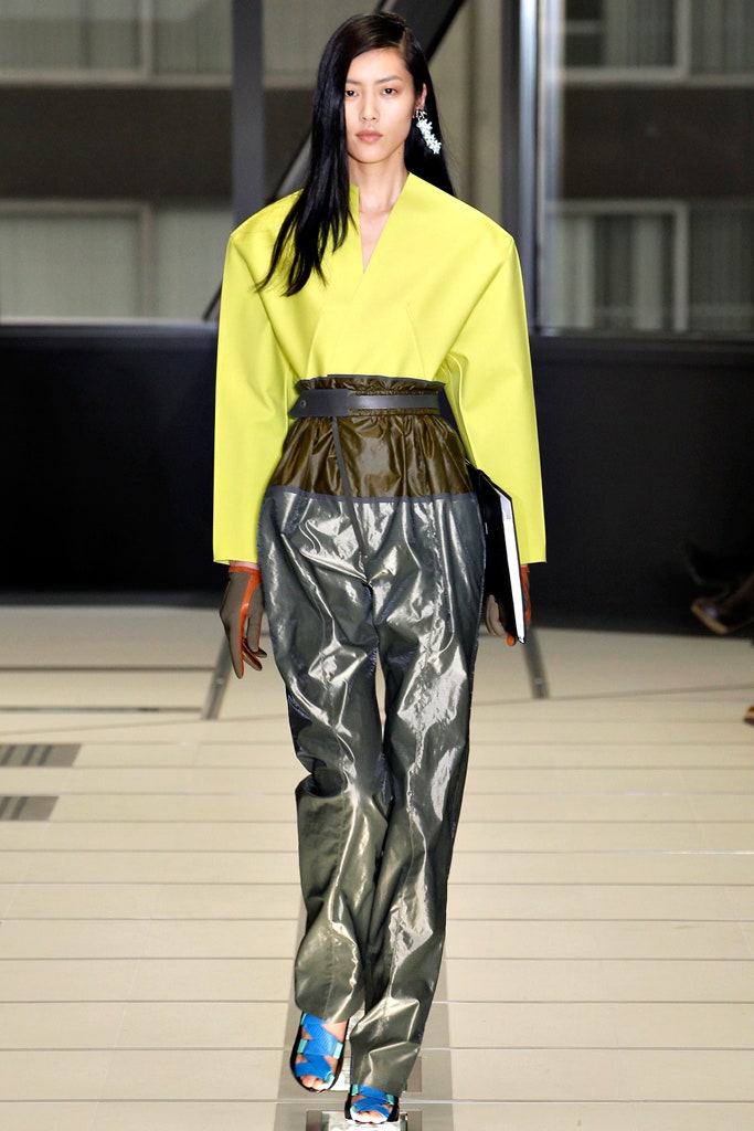 oversized yellow vinyl top and green pants