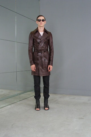 brown leather coat with black pants
