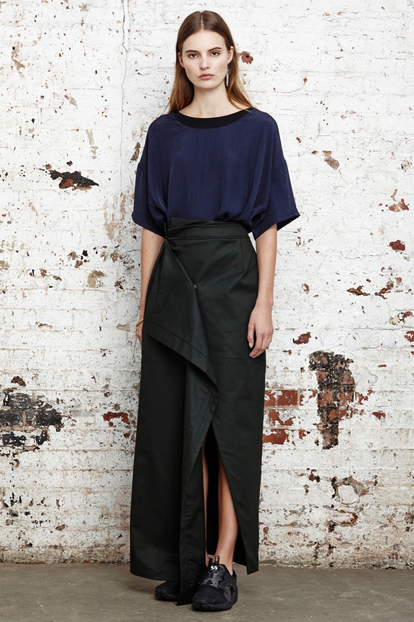 blue relaxed top with black skirt