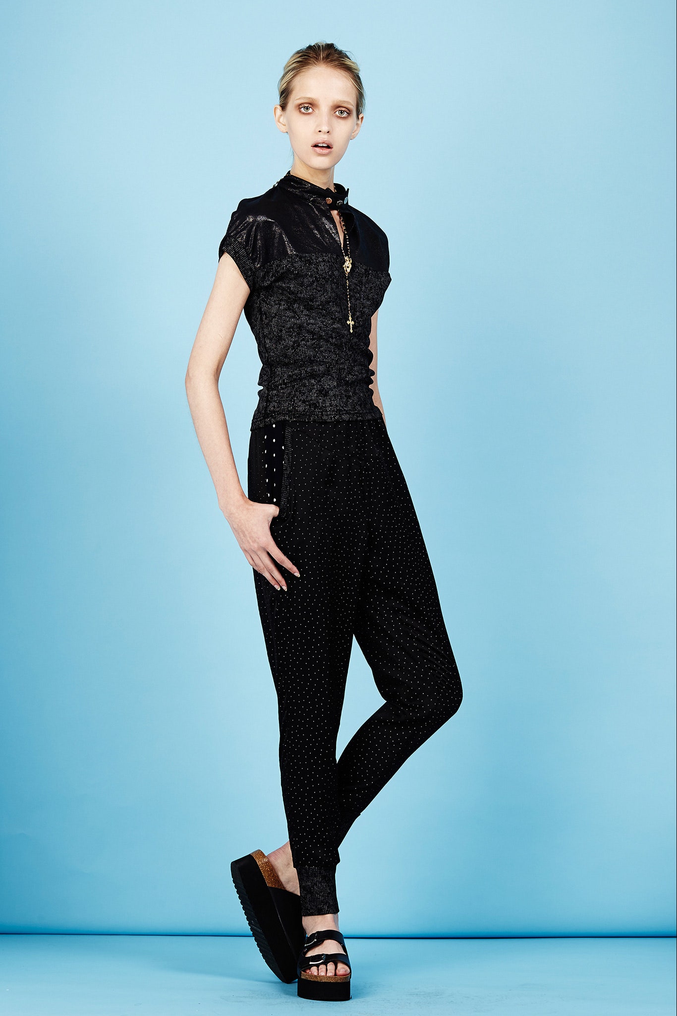 black embroidered silk top and relaxed pants