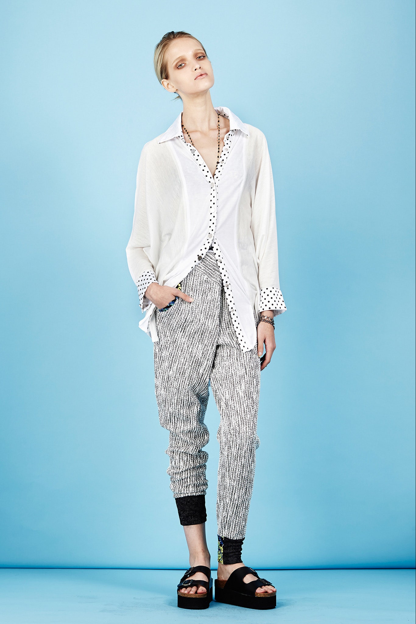 relaxed white shirt with striped pants
