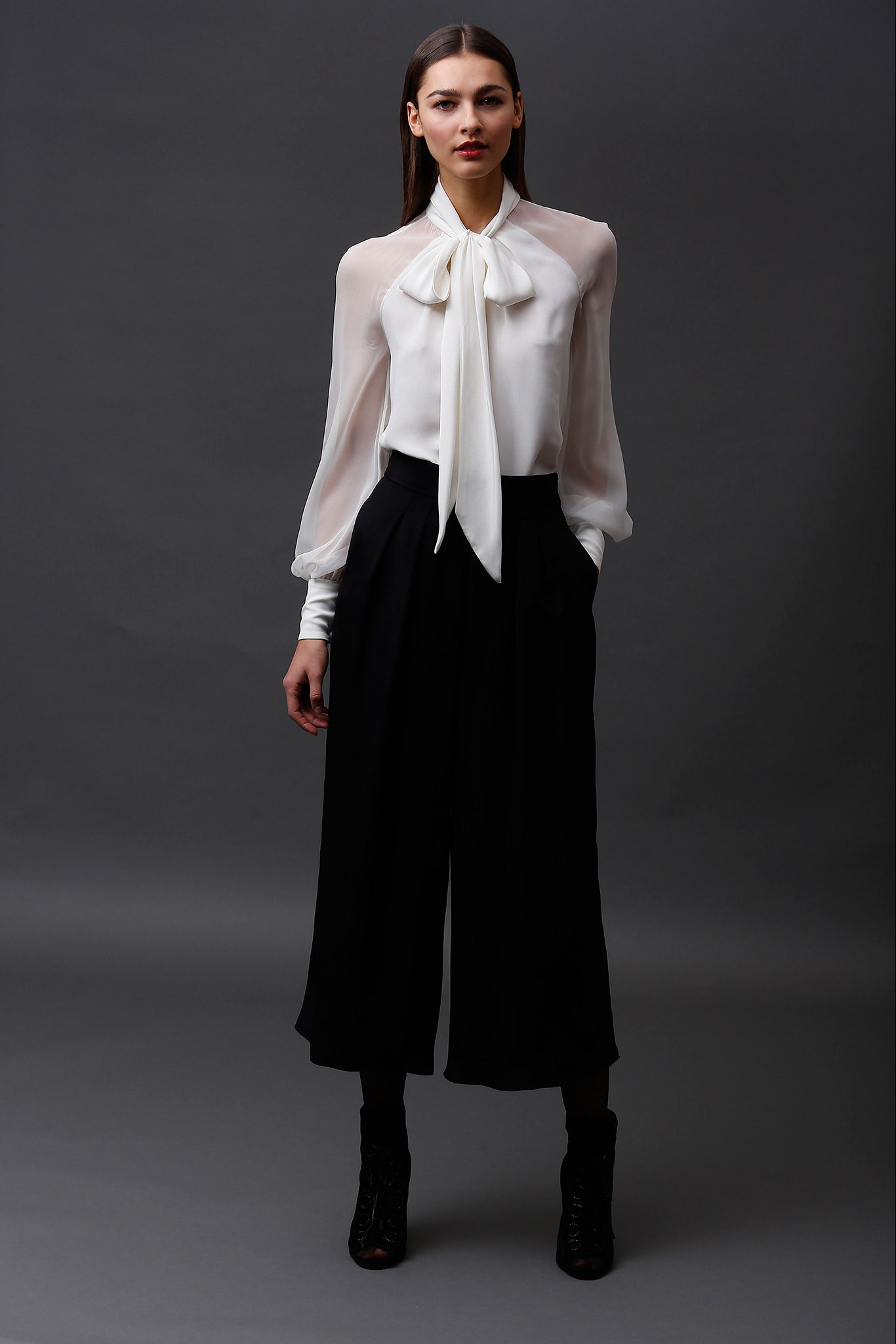 white silk long-sleeve collared fitted ruffled sheer blouse