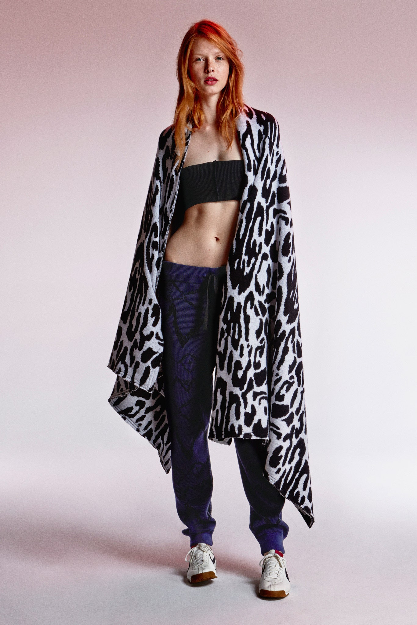 black fitted top with printed pants