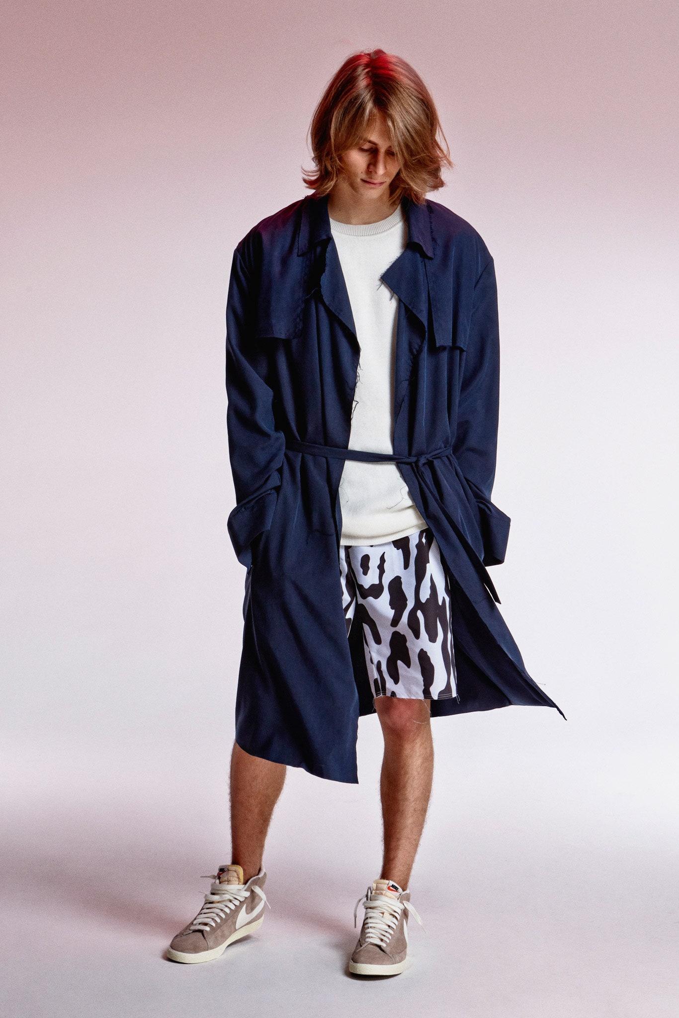 blue coat with white t-shirt and printed shorts