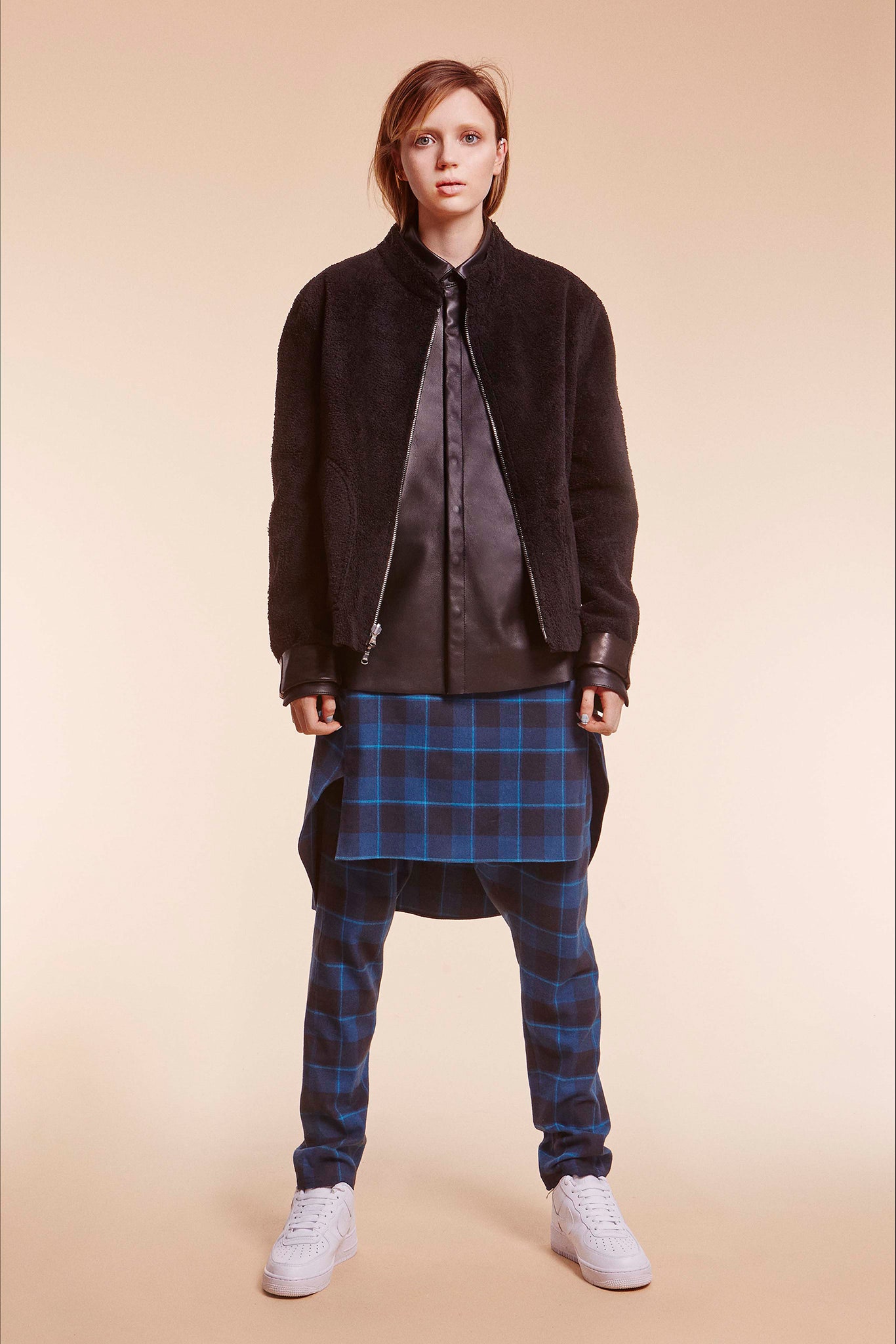 black faux-fur jacket with silk shirt