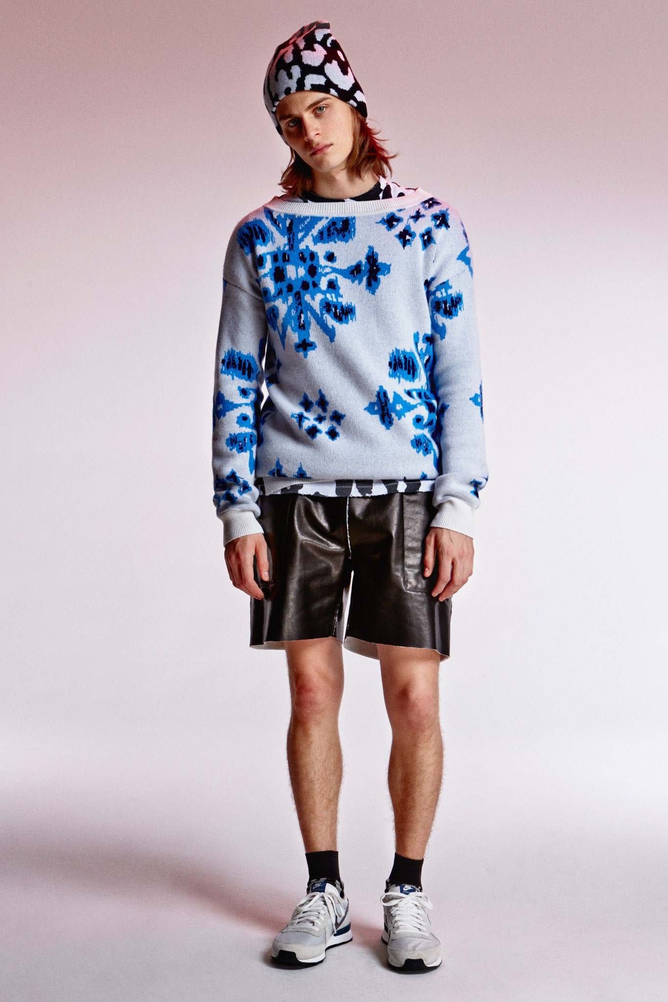 blue printed sweater with leather shorts