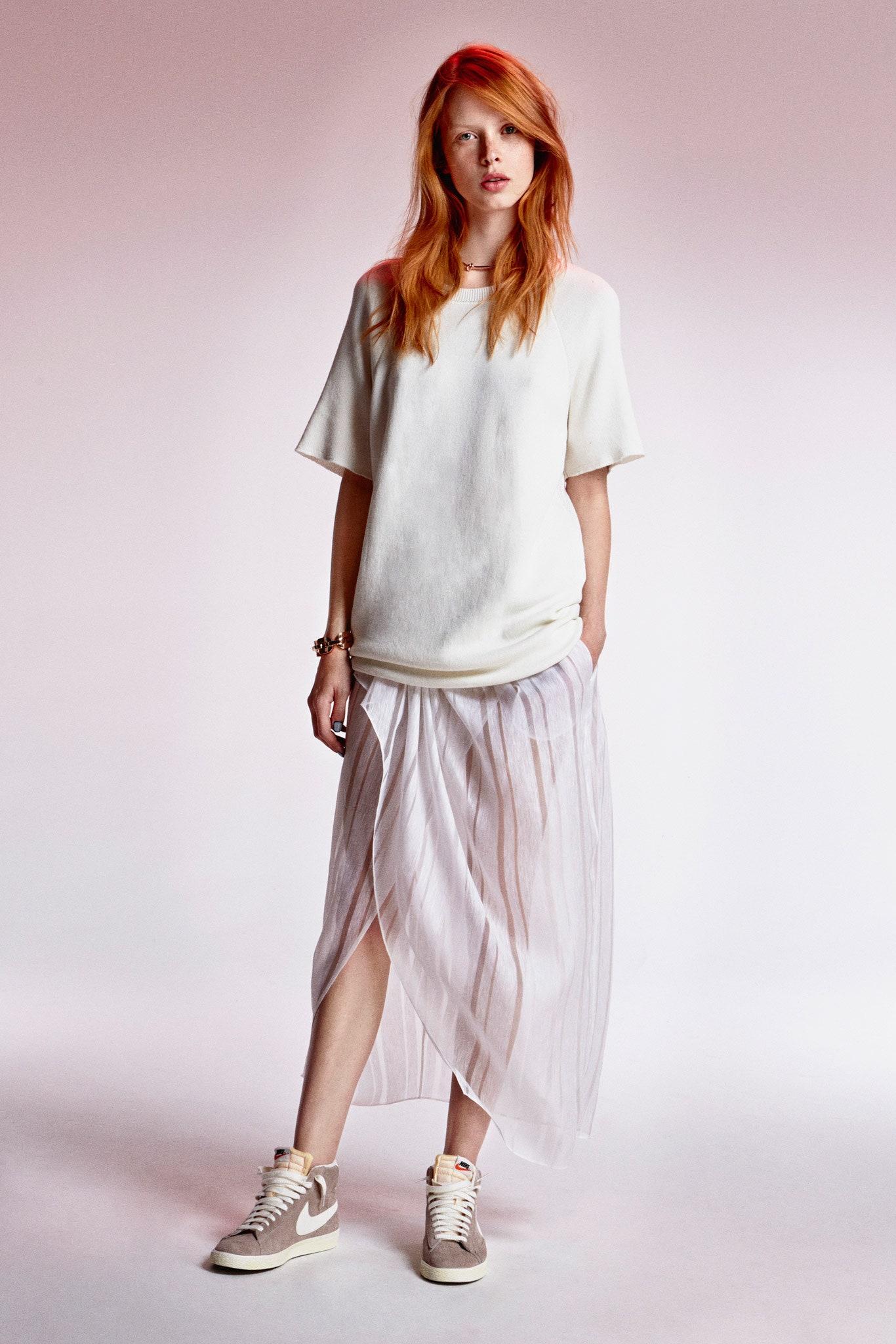 white relaxed top with pleated skirt