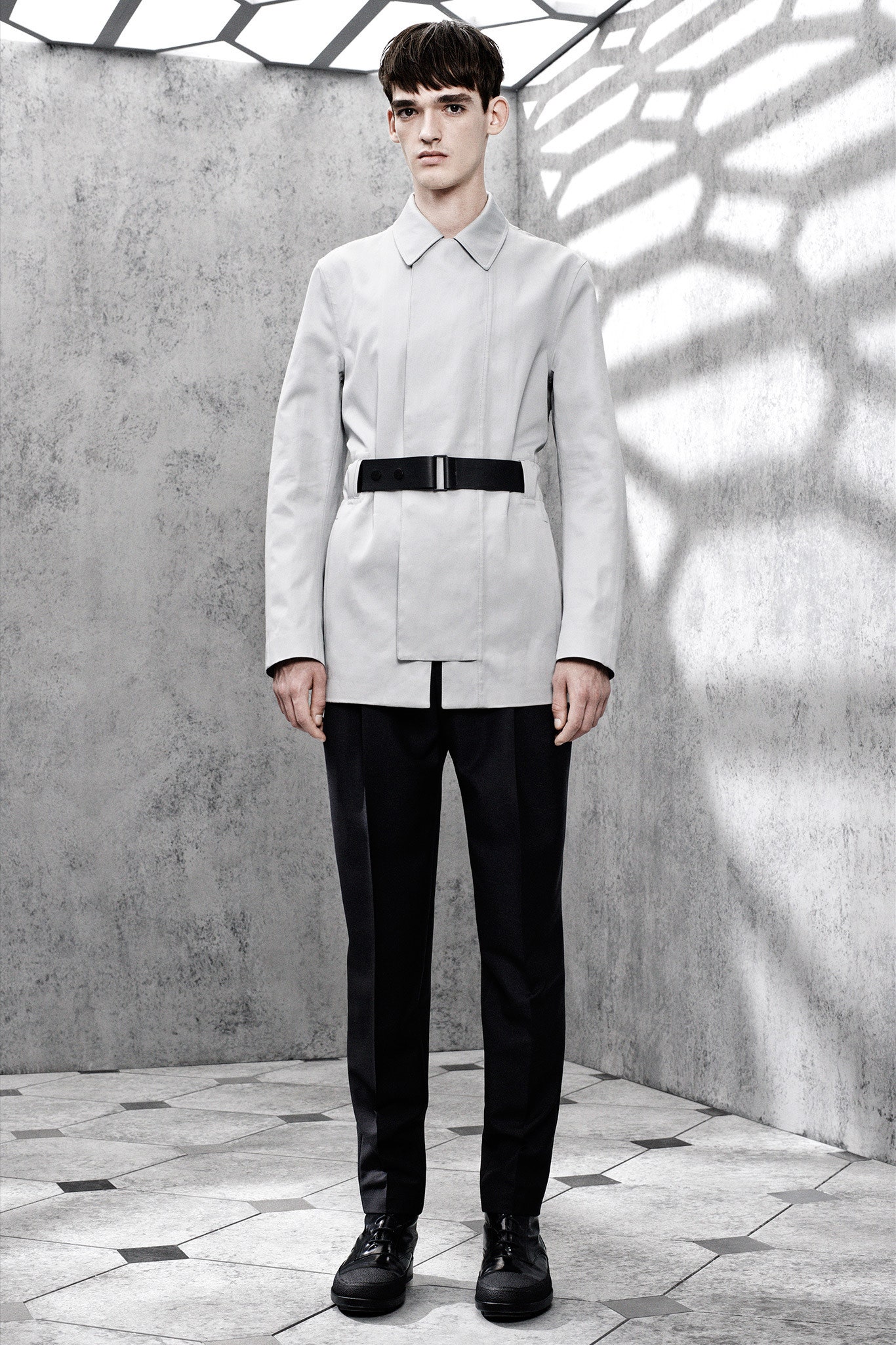 gray structured jacket with black pants