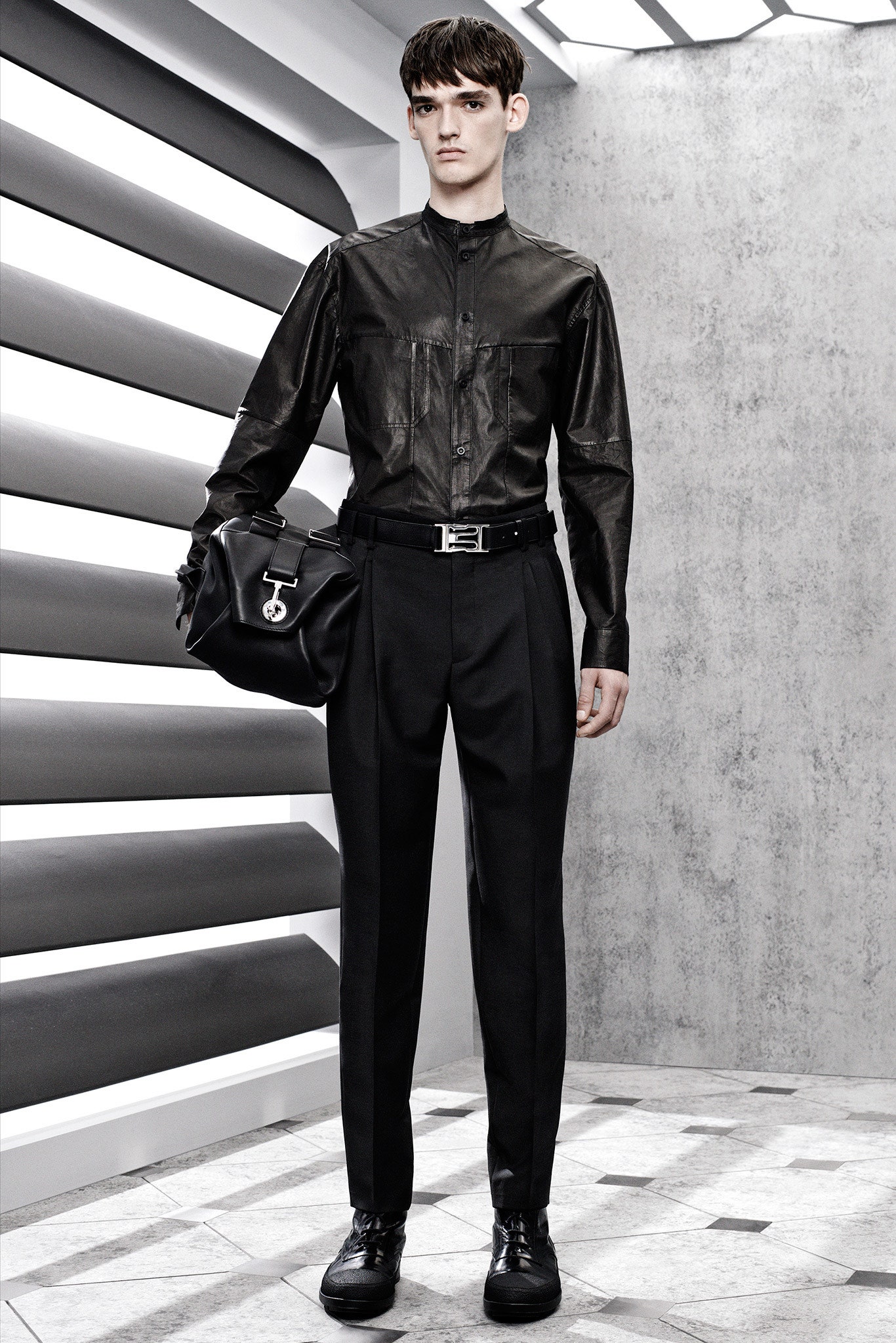 black leather shirt and tailored pants