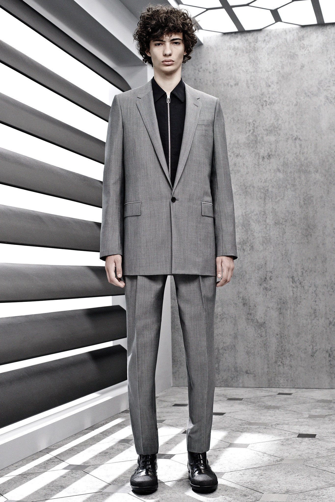 gray oversized suit with black shirt