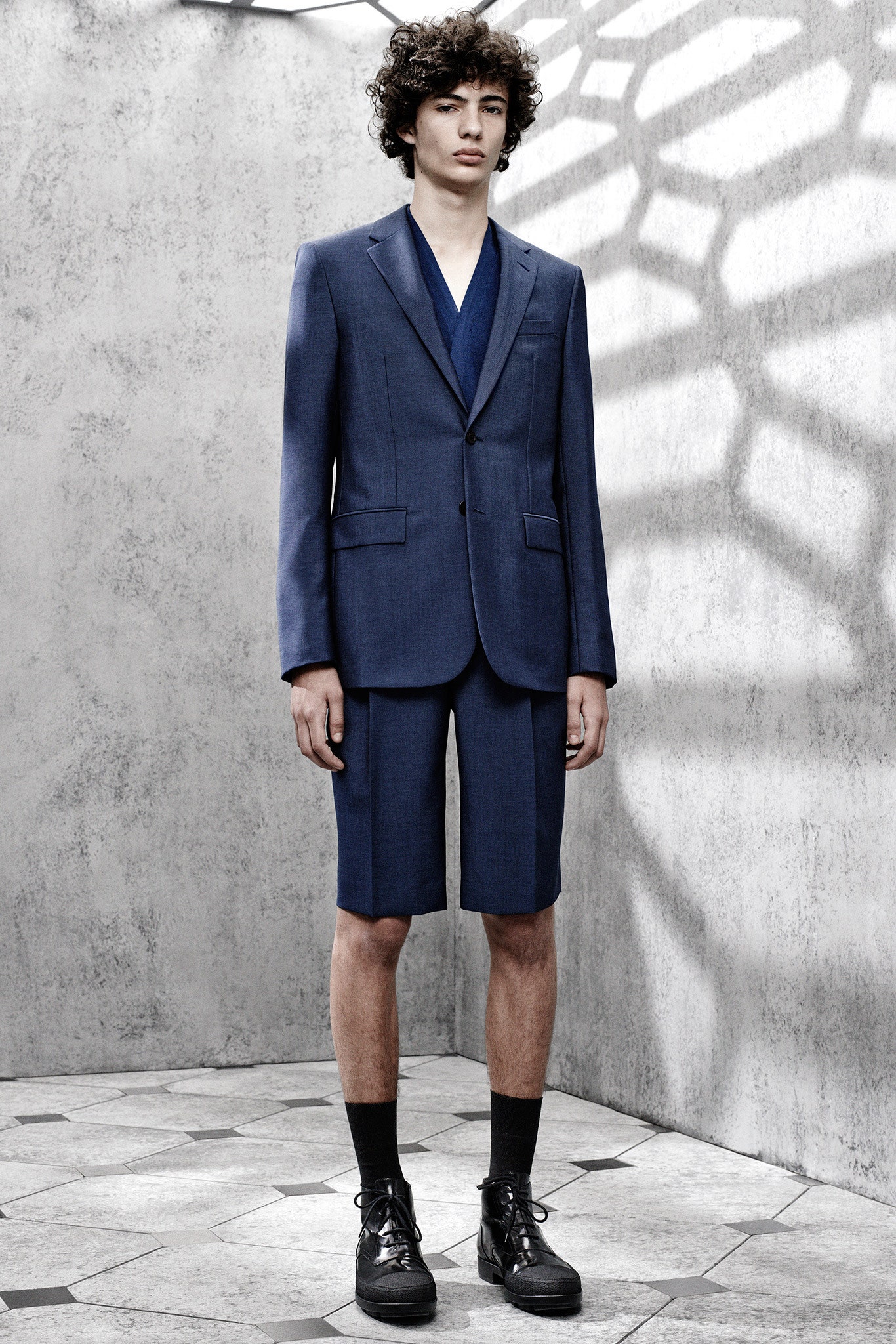 blue tailored suit with shorts