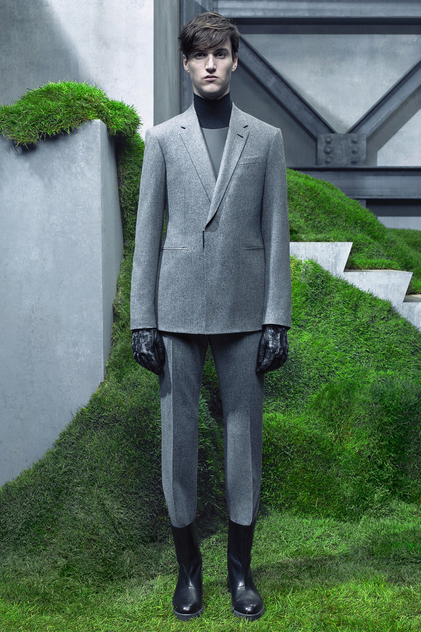 gray tailored suit with black boots