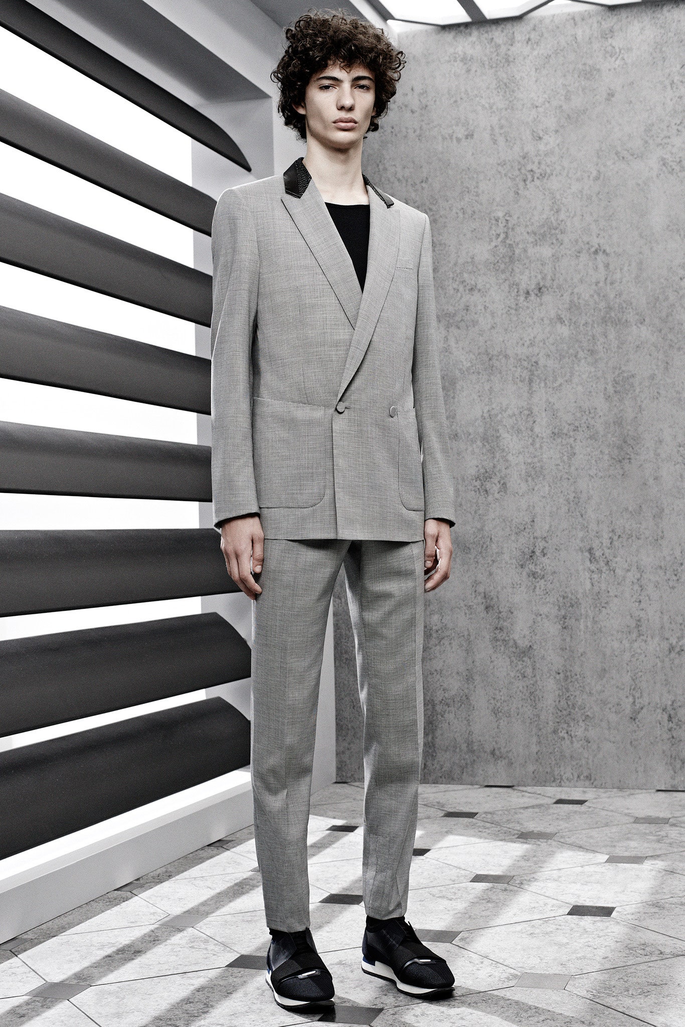 gray tailored suit with black shoes